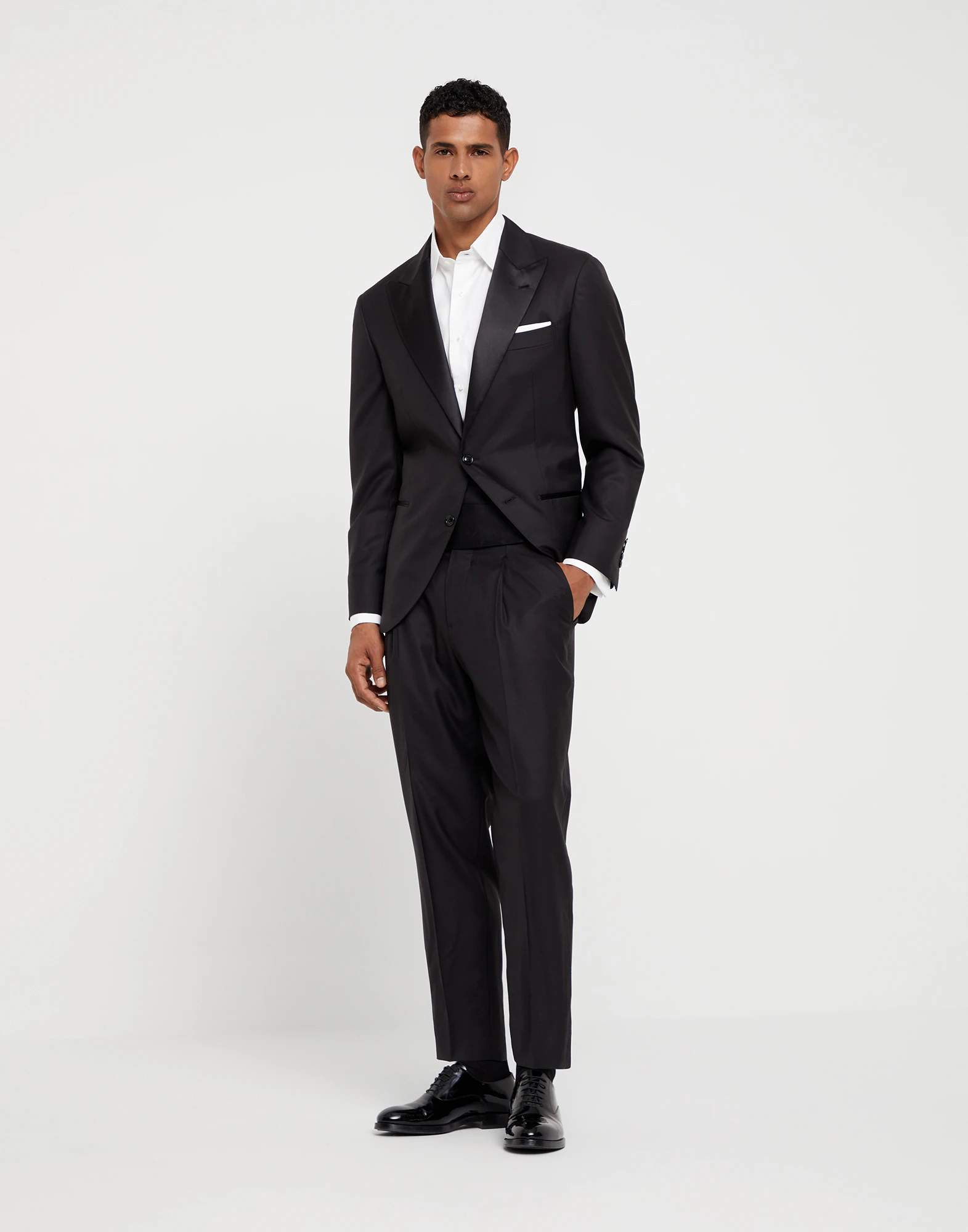 Lightweight virgin wool and silk twill tuxedo with peak lapel jacket and pleated trousers
