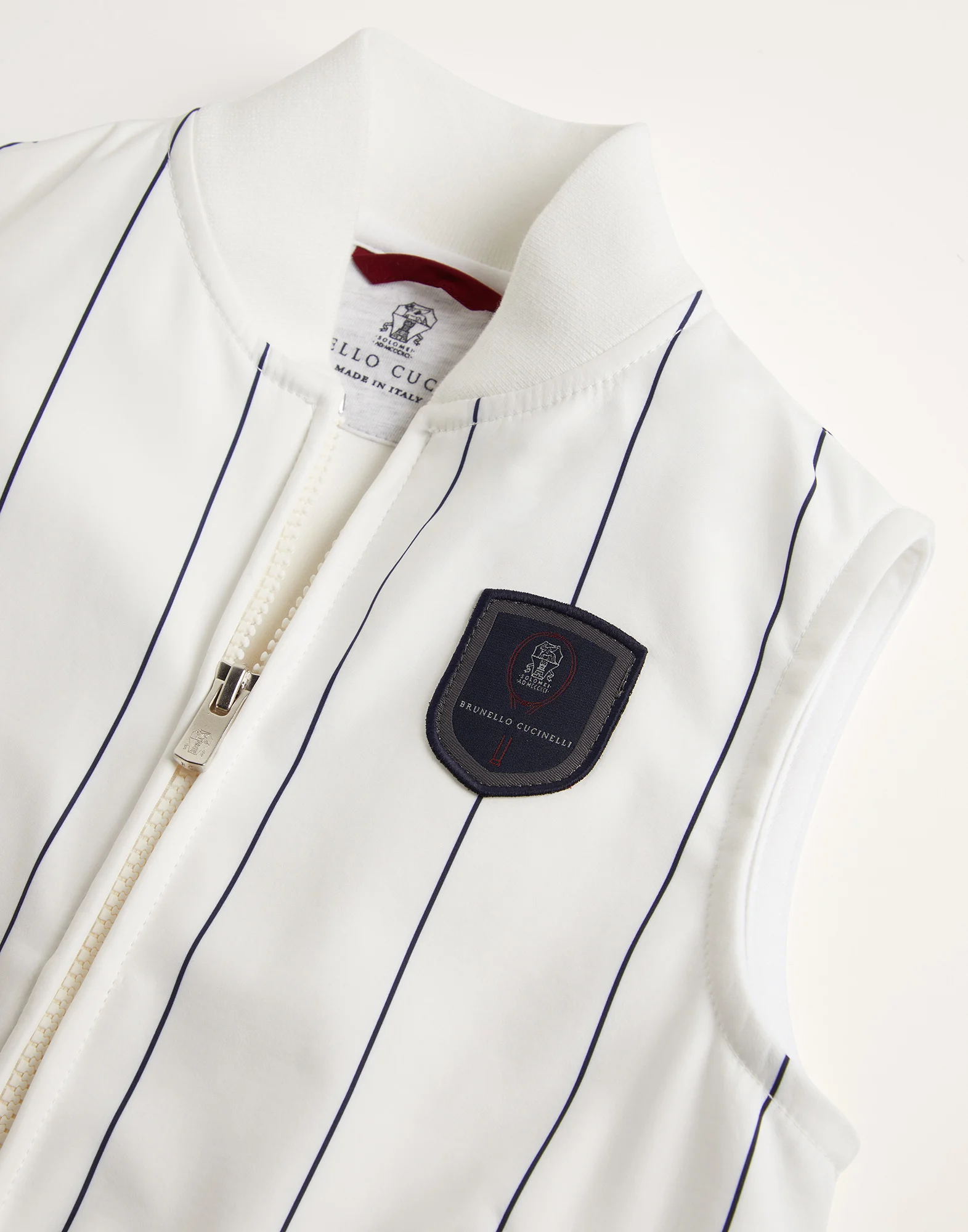 Chalk stripe nylon sleeveless sweatshirt with zipper and tennis badge