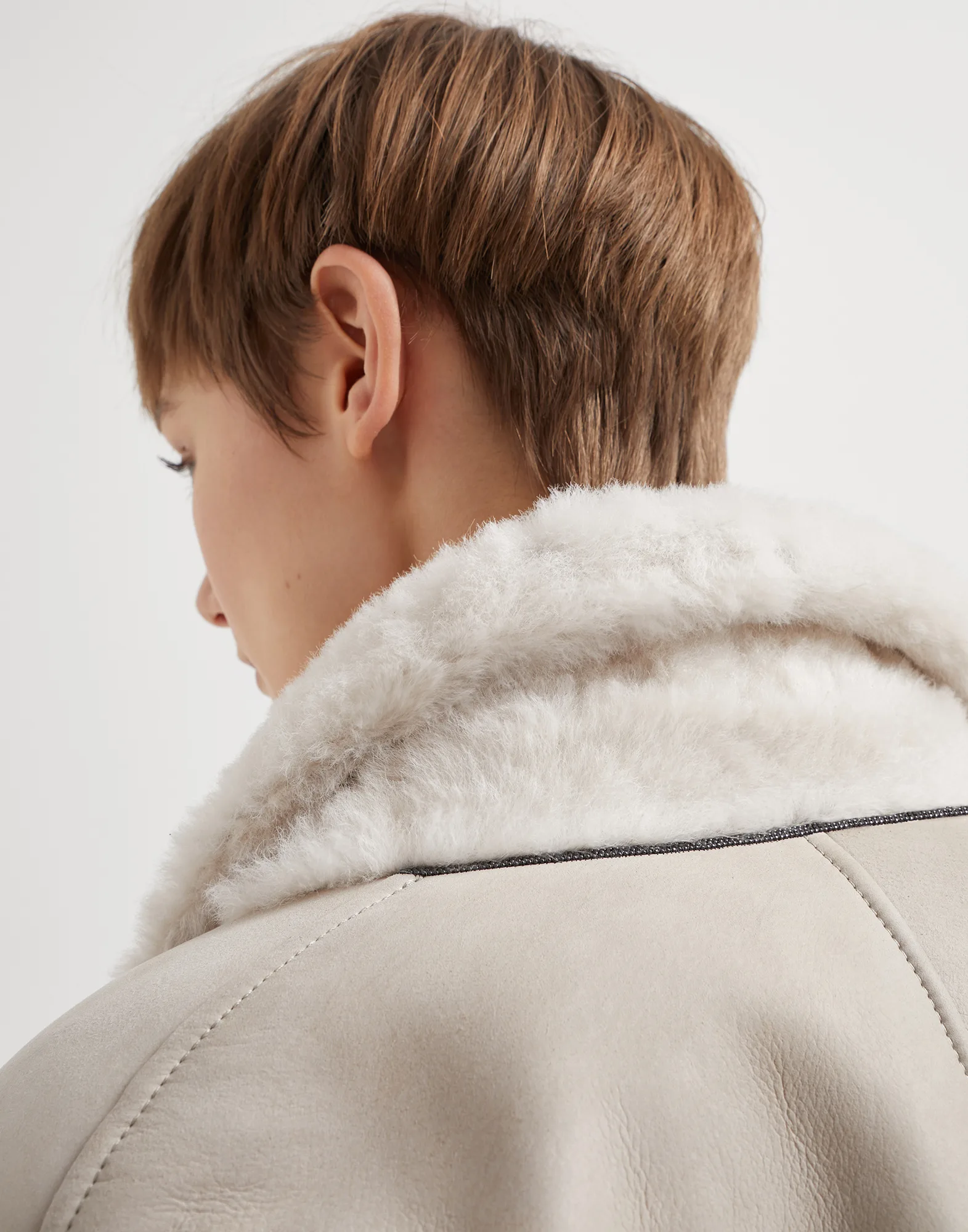 Fuzzy shearling reversible outerwear jacket with monili