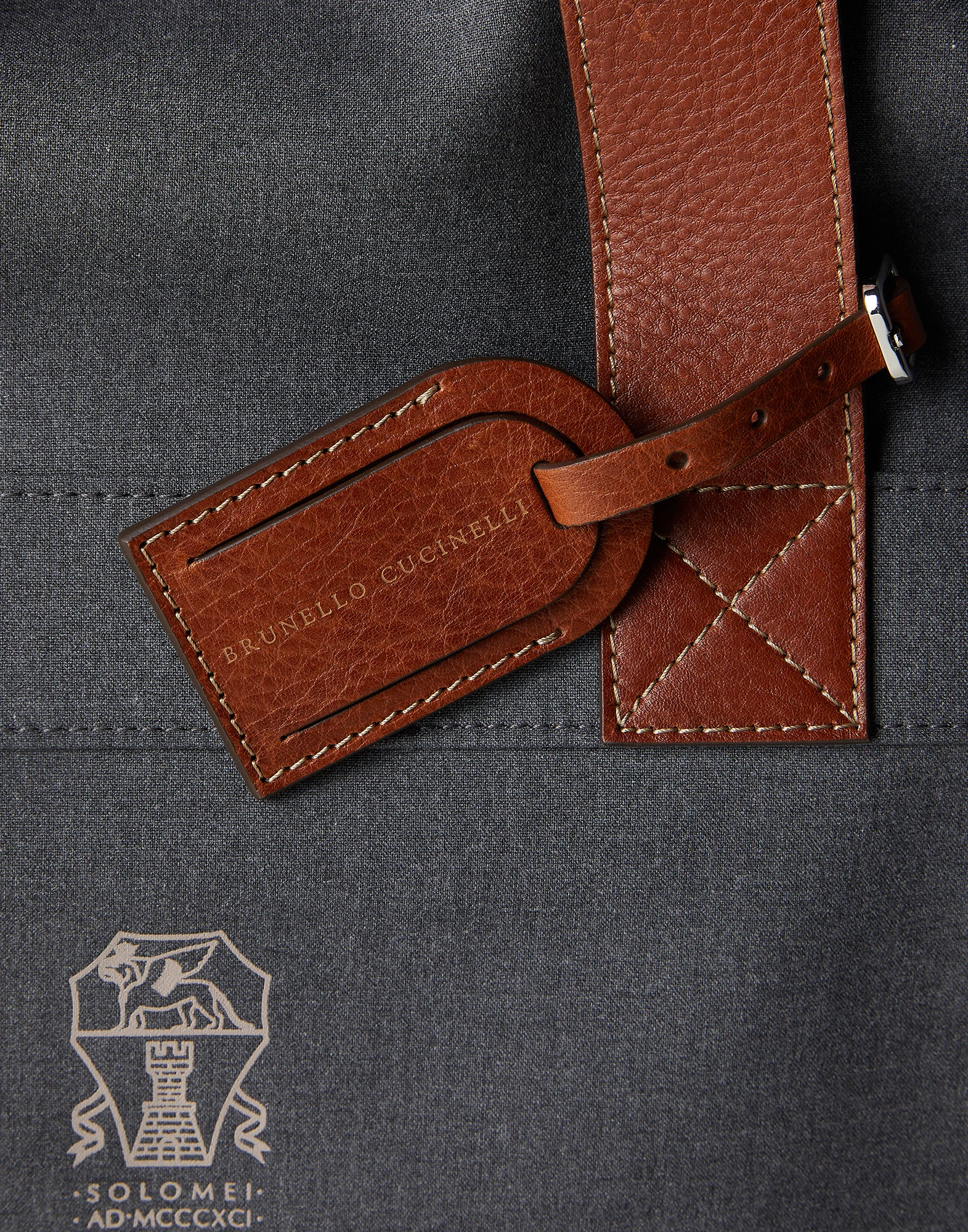 Water-resistant fabric and grained calfskin garment bag