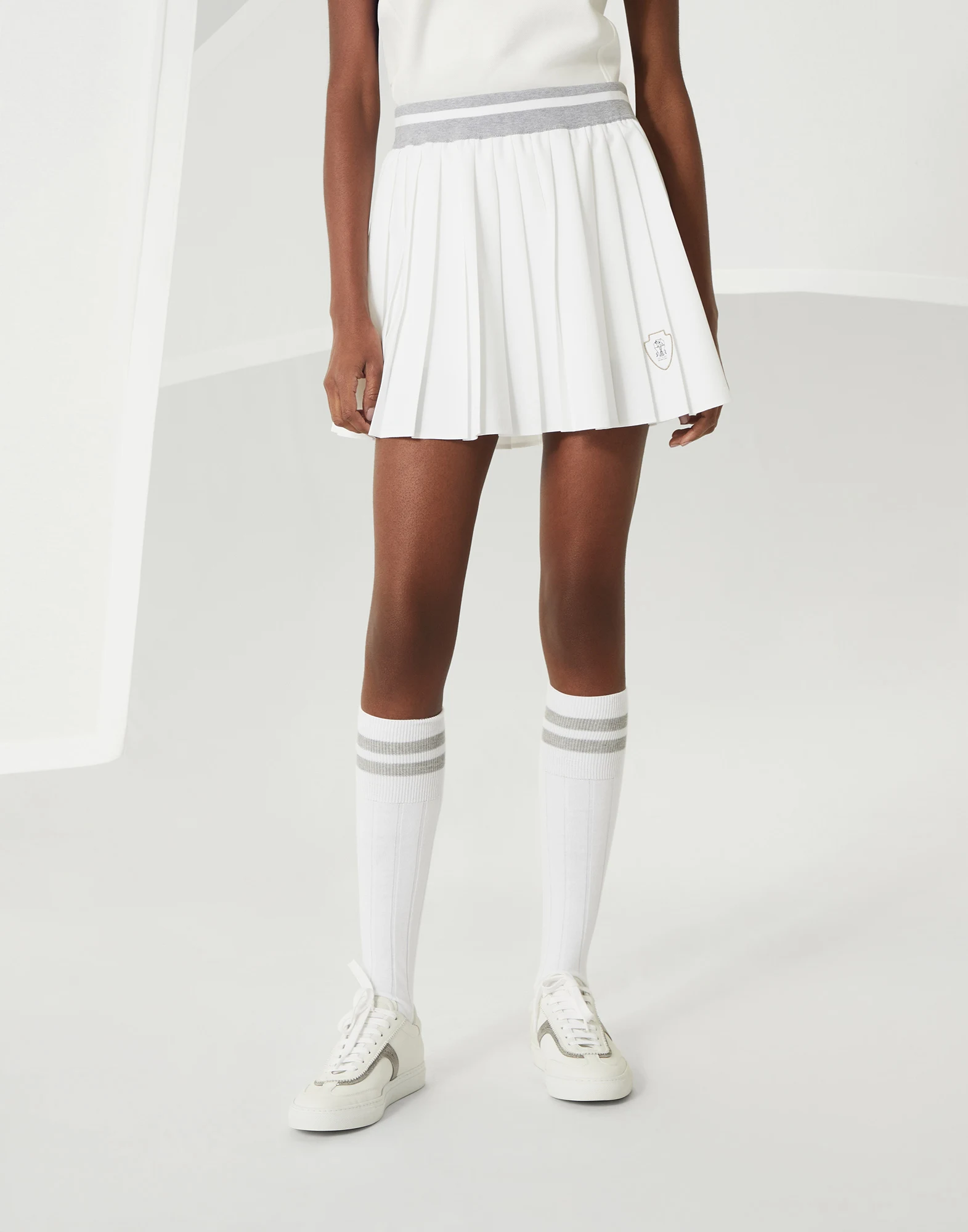 Pleated skirt with logo