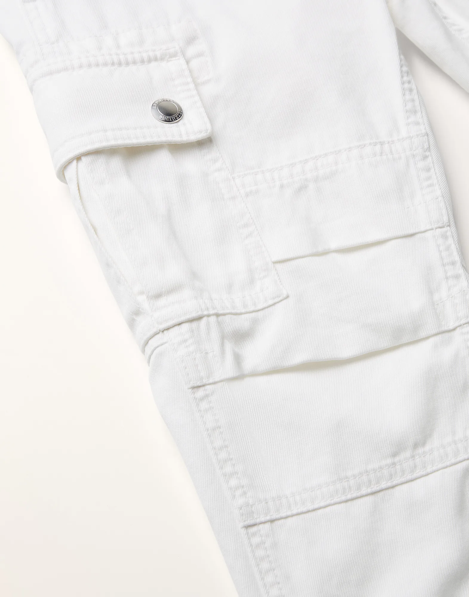 Garment-dyed trousers in twisted cotton gabardine with cargo pockets
