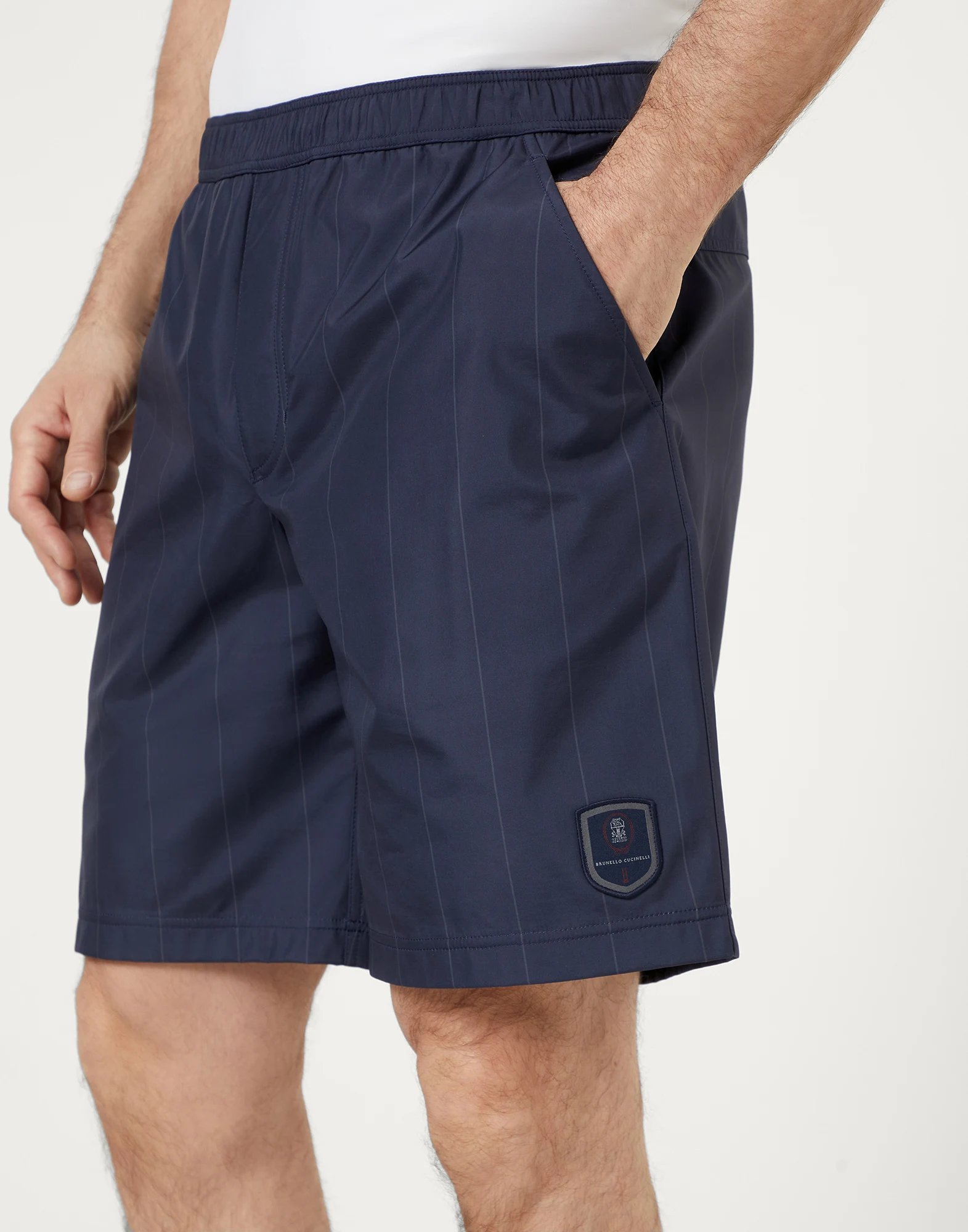 Chalk stripe nylon Bermuda shorts with tennis badge