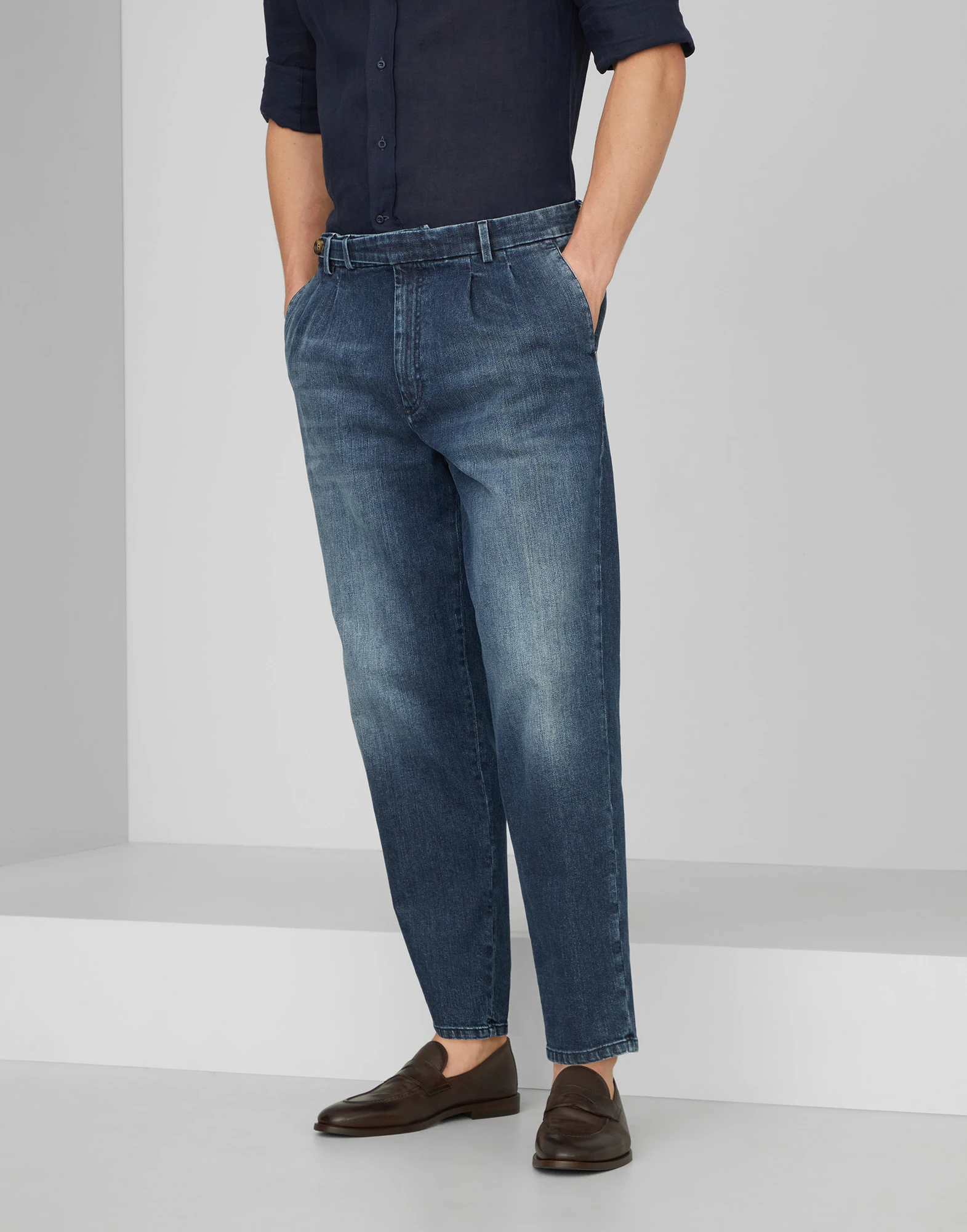 Comfort cotton denim leisure fit trousers with double pleats and tabbed waistband