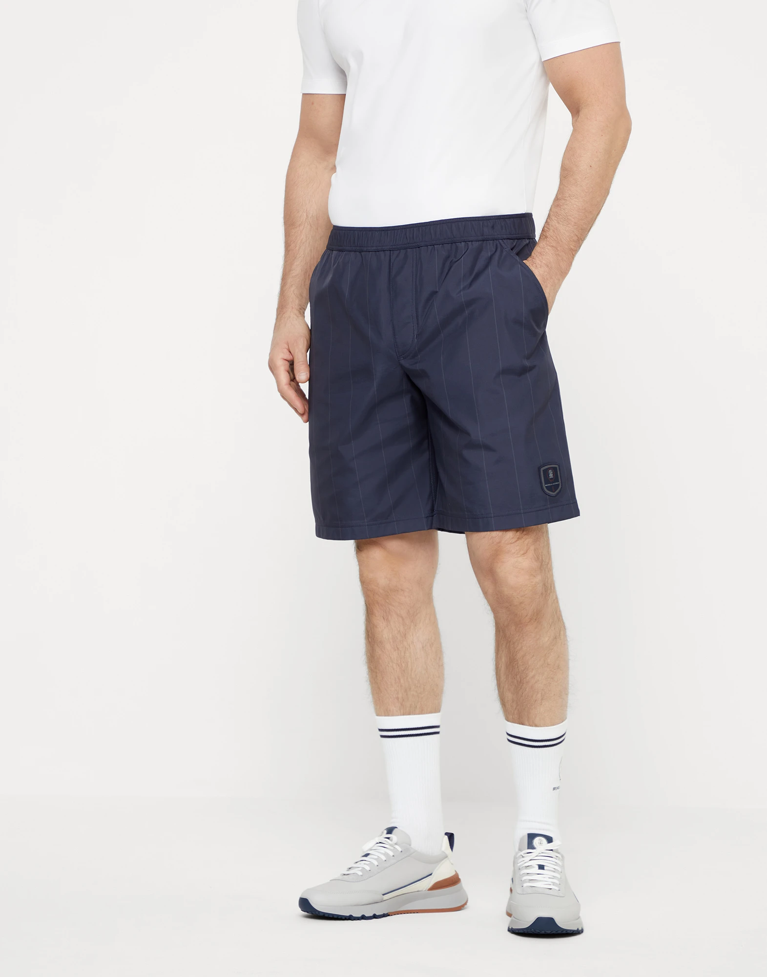 Chalk stripe nylon Bermuda shorts with tennis badge