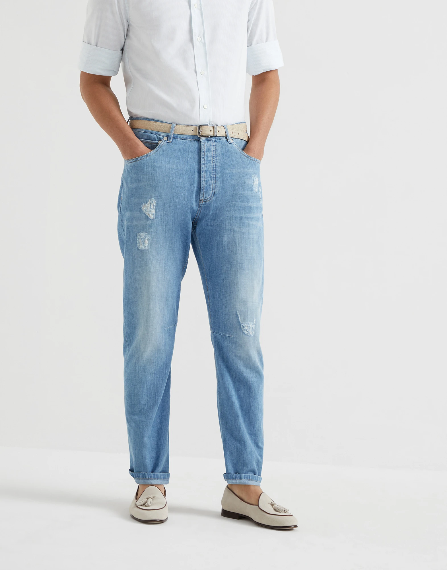 Denim trousers with rips