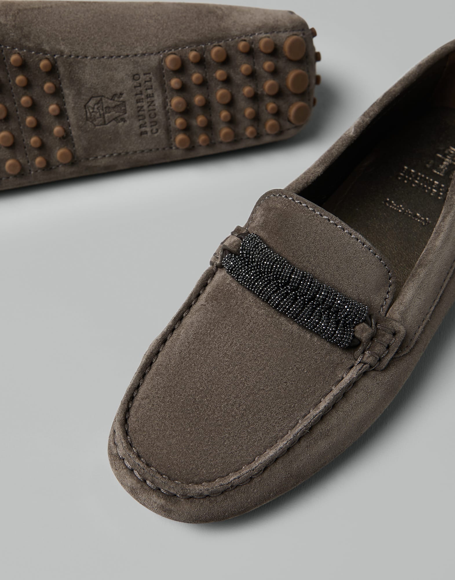 Suede driving shoes with precious braided detail