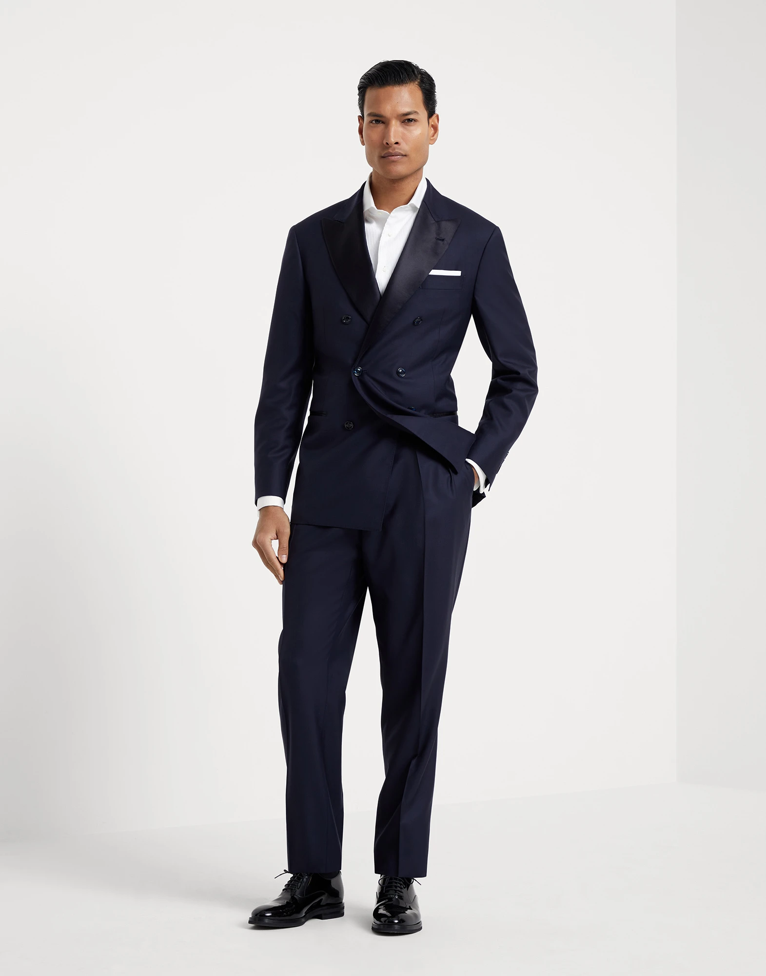 Lightweight virgin wool and silk twill tuxedo with one-and-a-half breasted jacket and double-pleated trousers