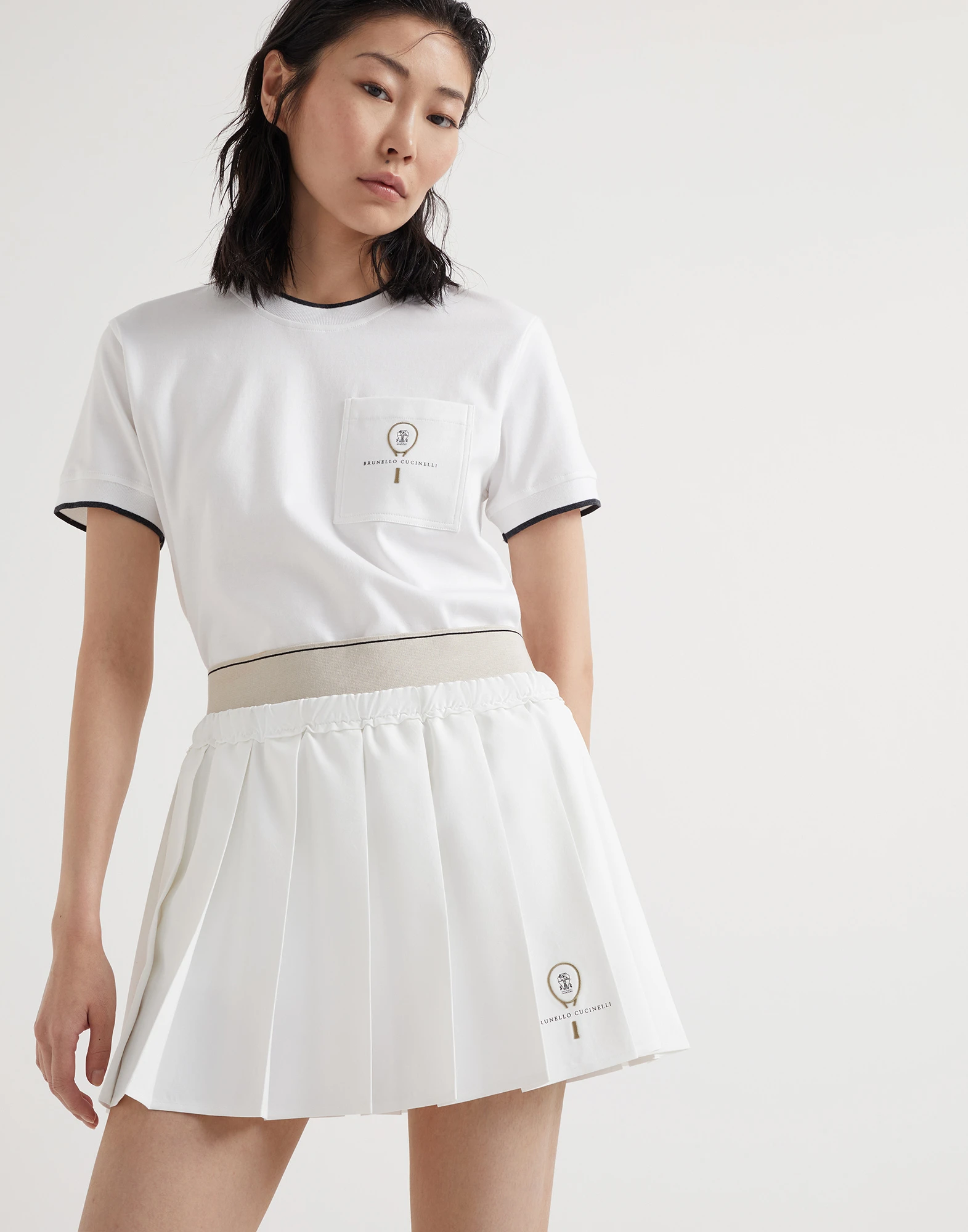Pleated techno poplin mini skirt with tennis logo