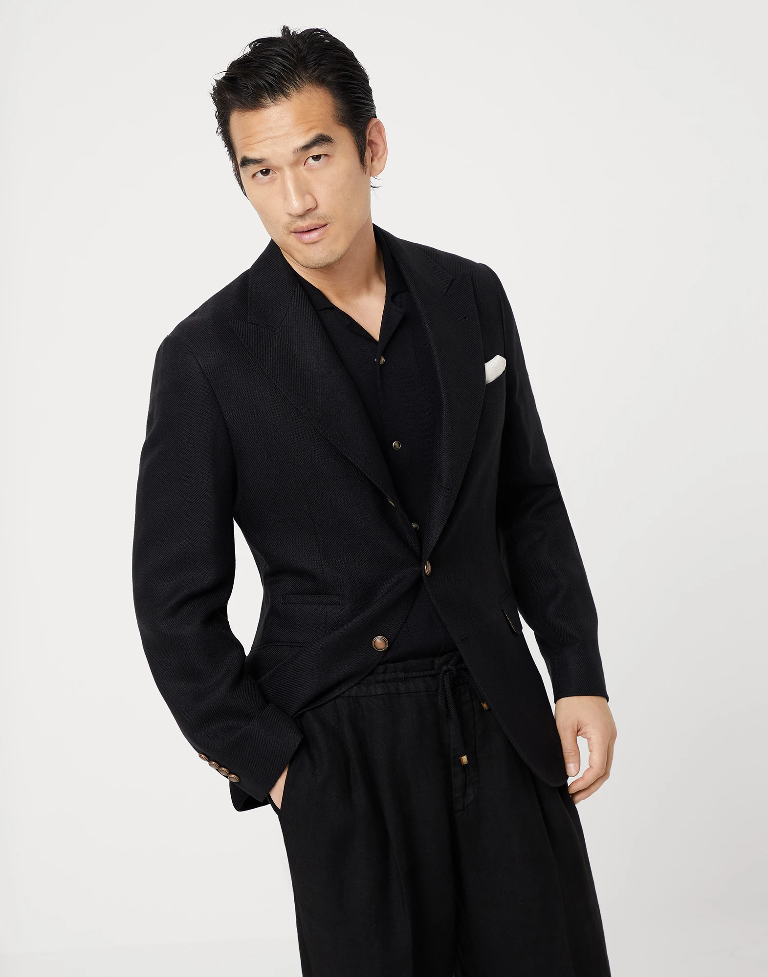 Linen, wool and silk diagonal deconstructed blazer with large peak lapels and metal buttons