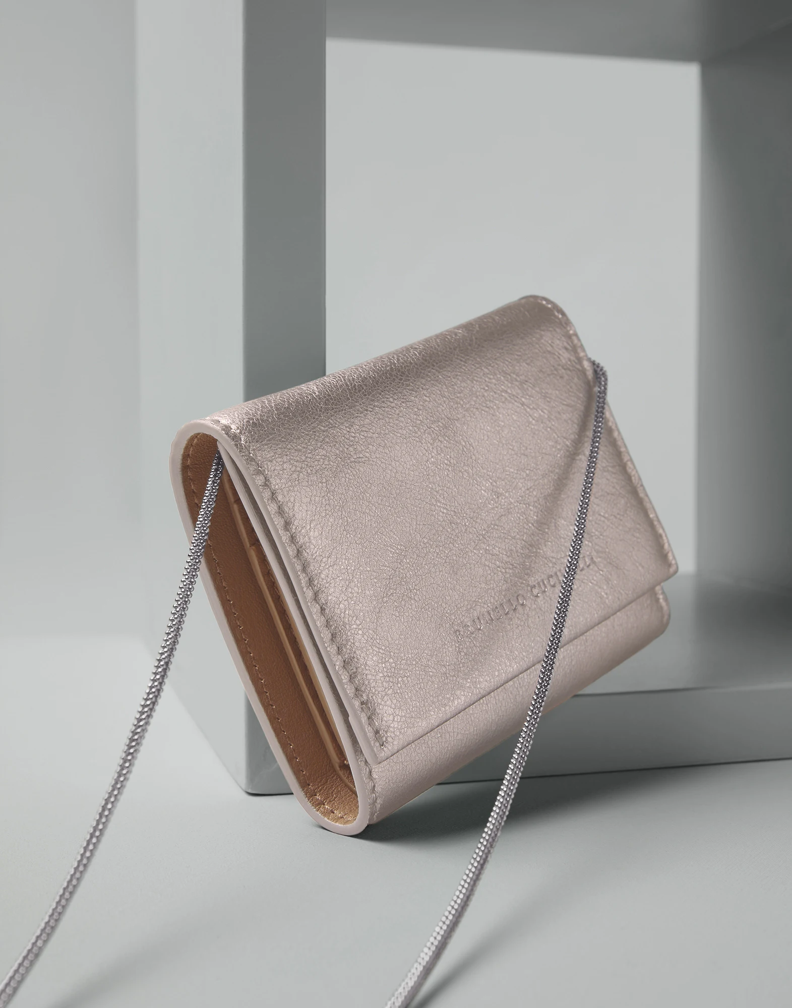 Lame calfskin wallet with precious chain