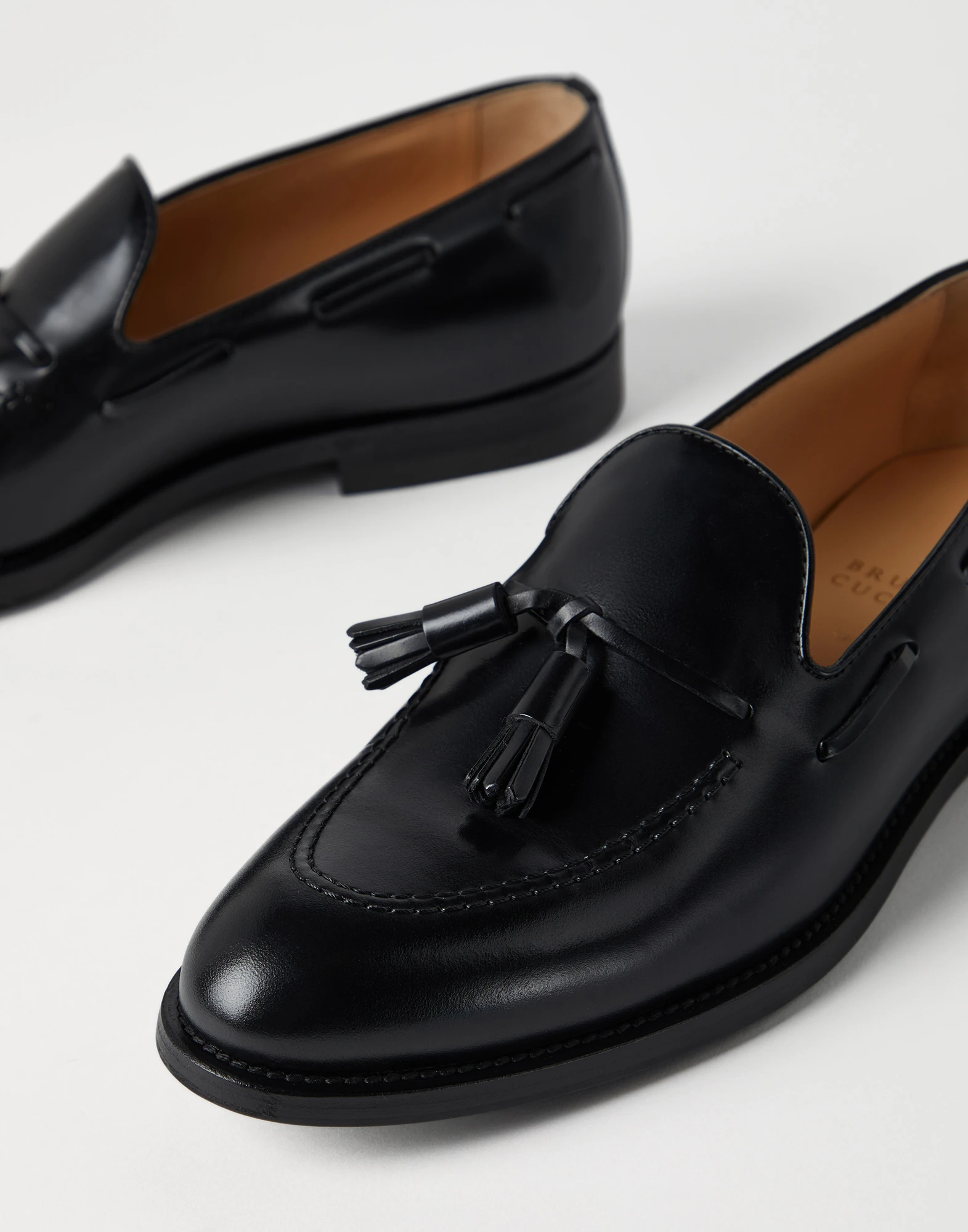 Aged calfskin loafers with tassels