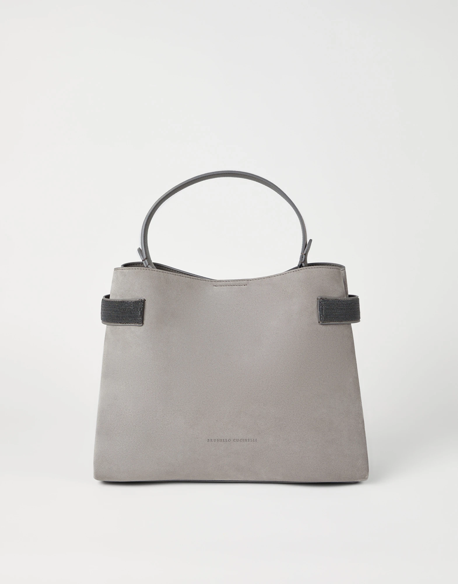 Suede bag with precious bands