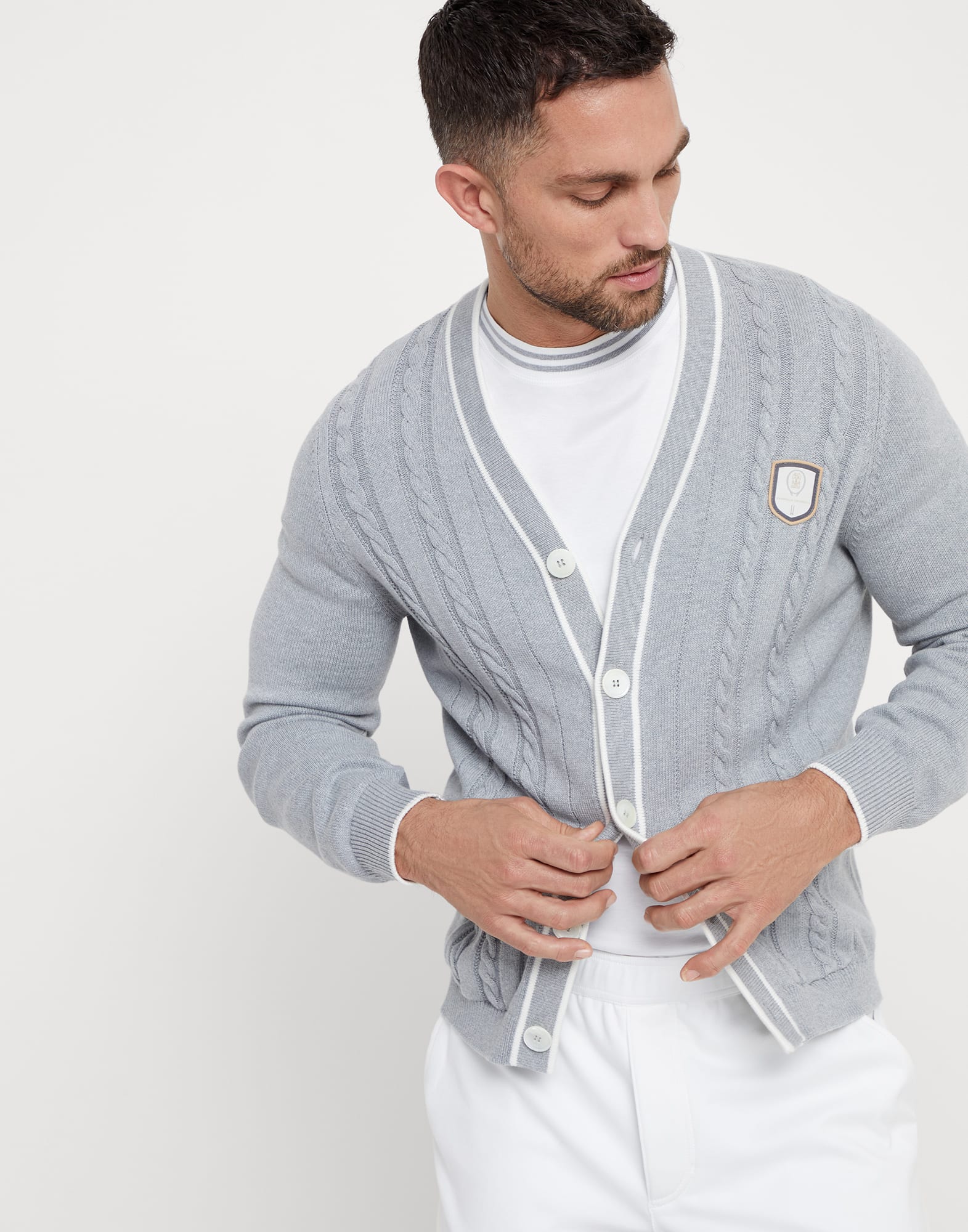 Cotton cable knit cardigan with tennis badge