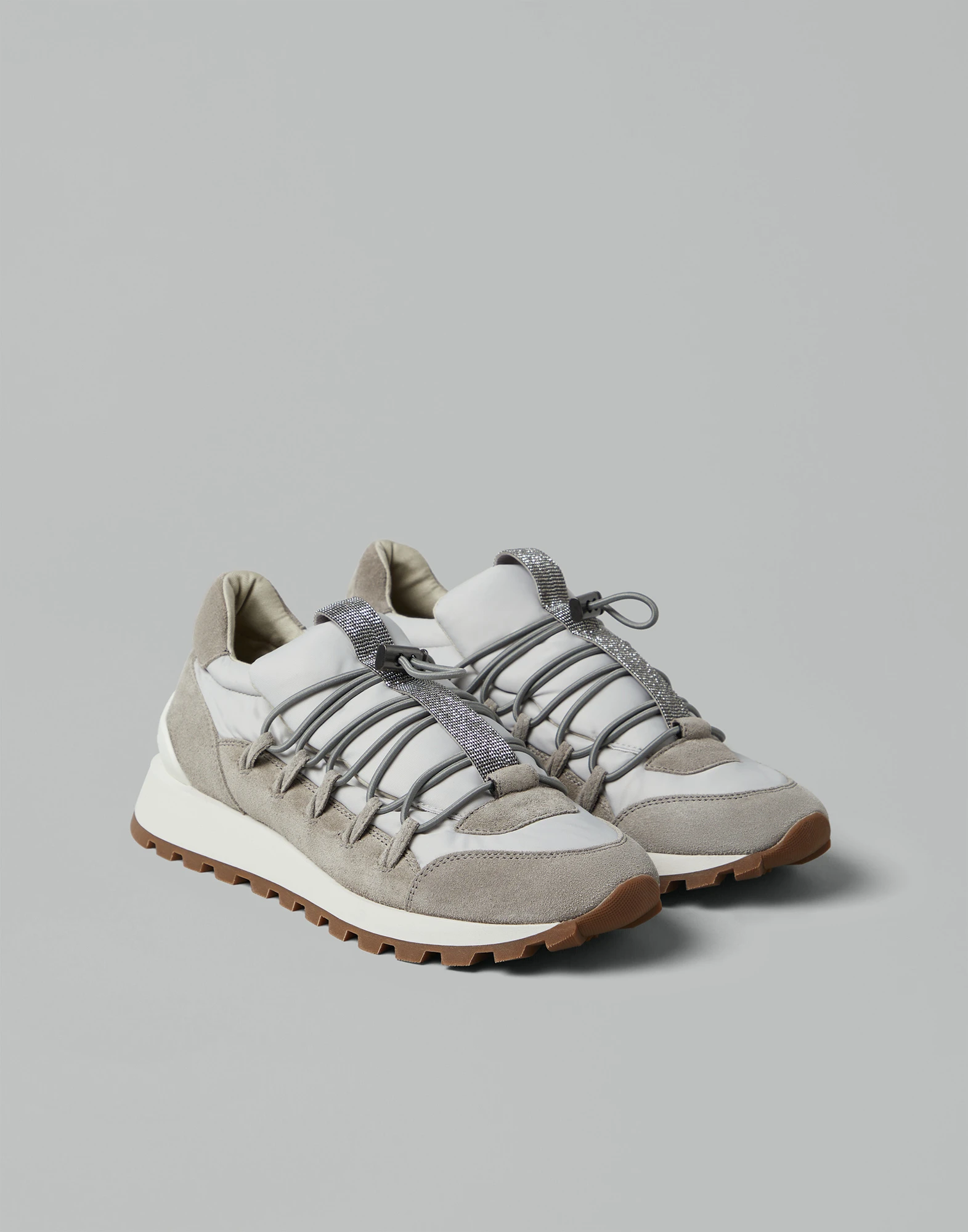 Suede and techno fabric runners with precious detail