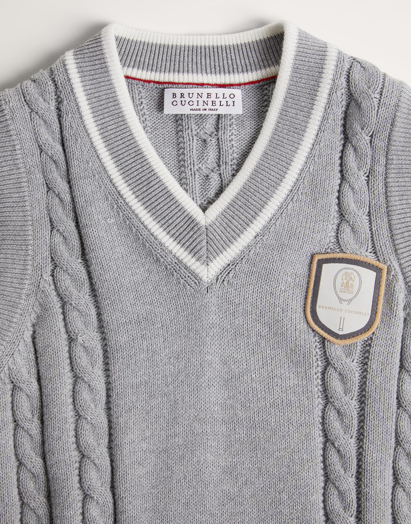 Cotton cable knit vest with tennis badge