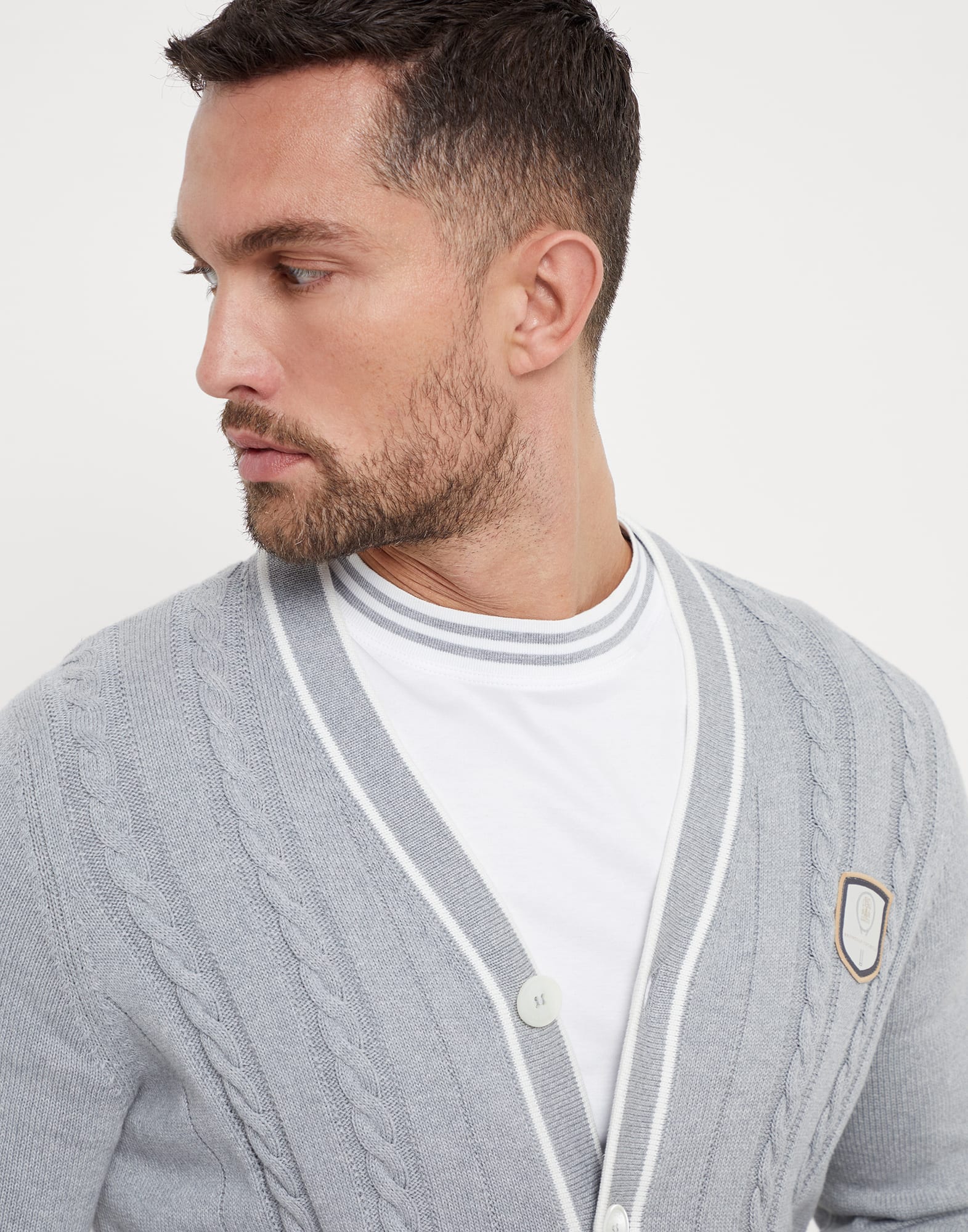 Cotton cable knit cardigan with tennis badge