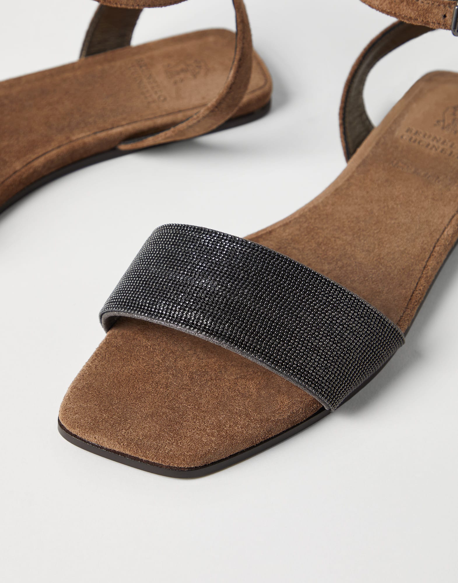 Suede sandals with precious strap