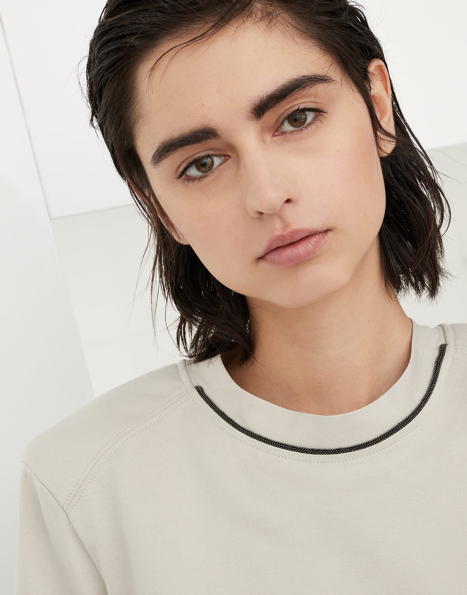 Cotton jersey T-shirt with padded shoulder and shiny neckline