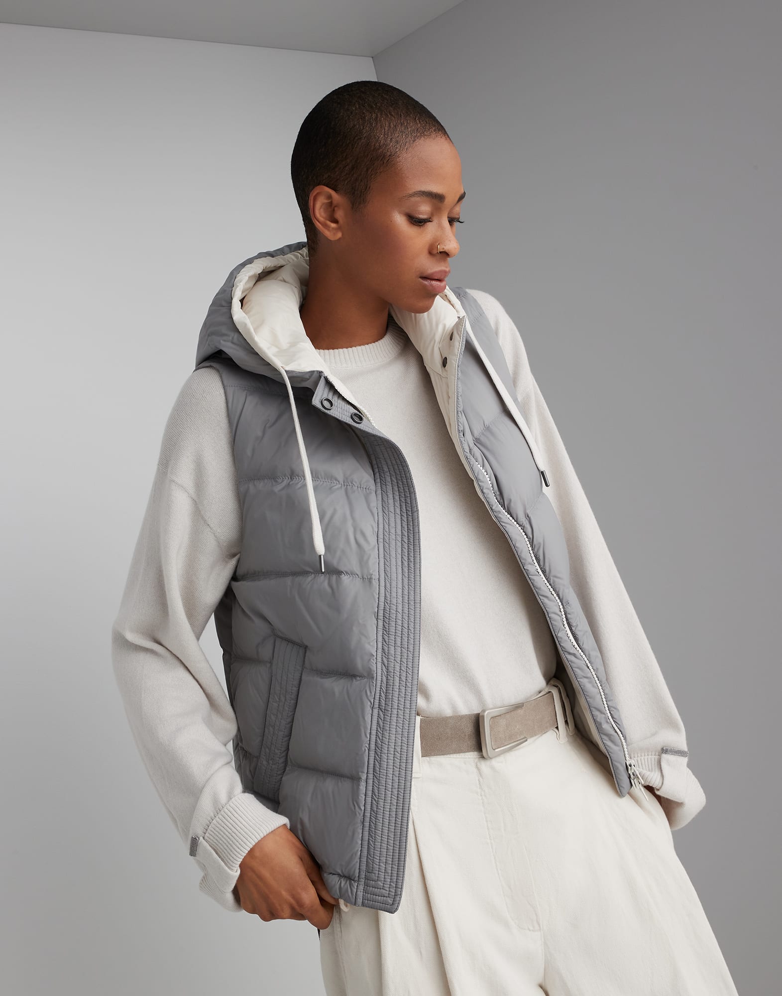Lightweight matte nylon down vest with hood and shiny trim