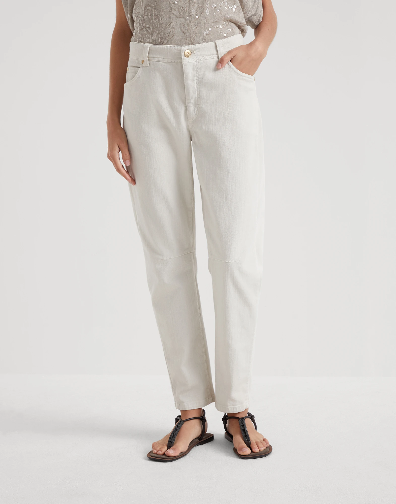 Stretch dyed denim slim tapered trousers with monili