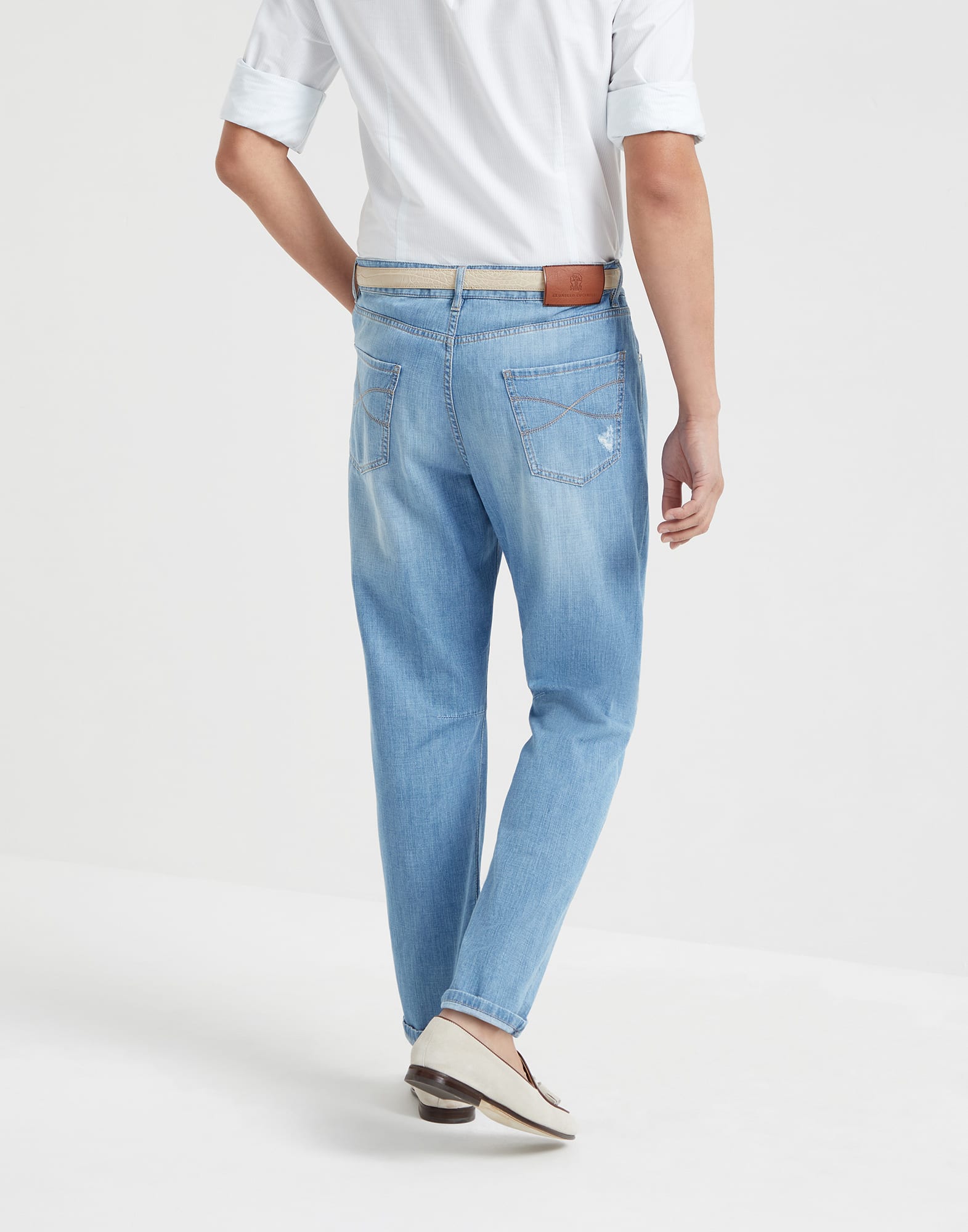 Denim trousers with rips