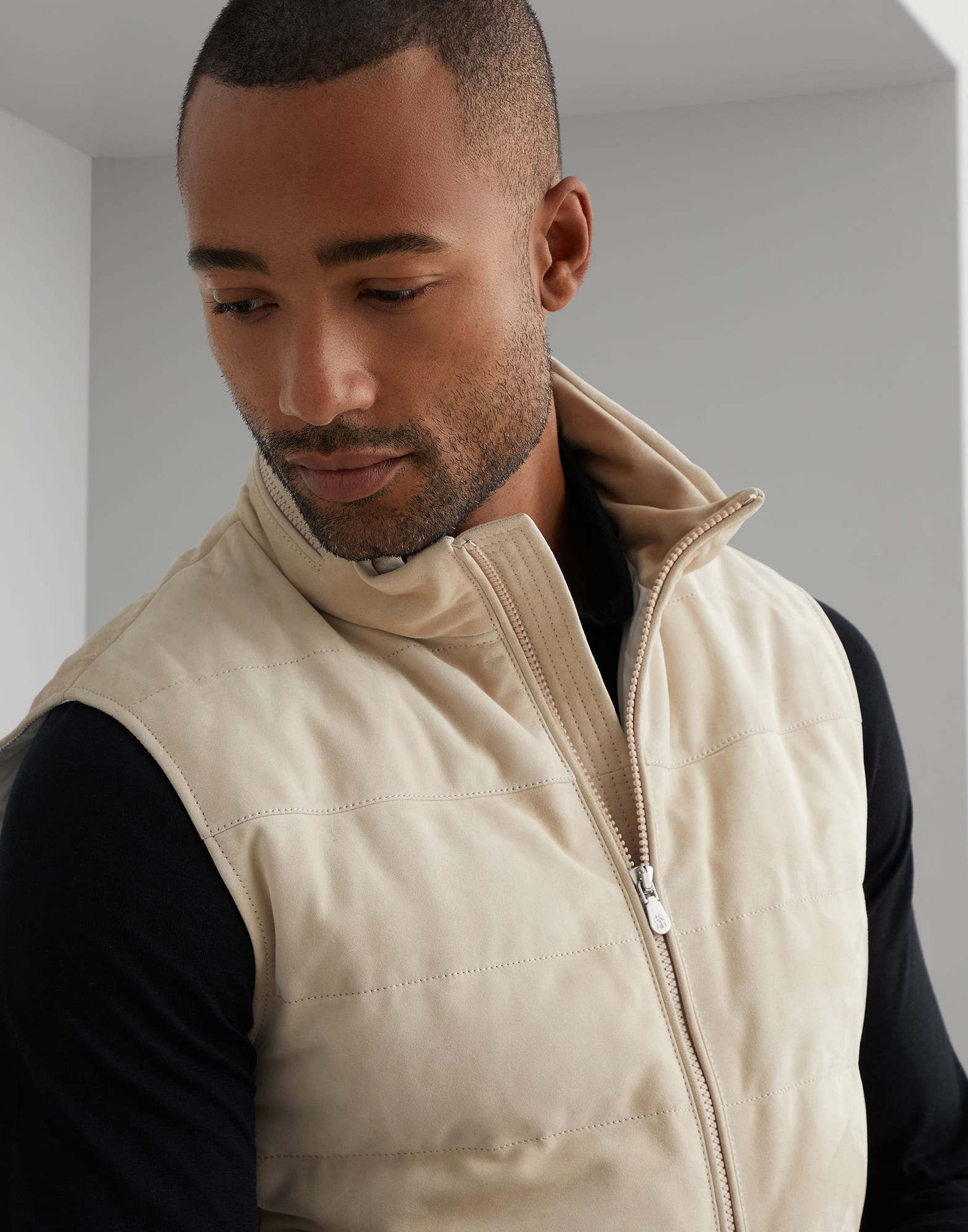 Suede down vest with packable hood