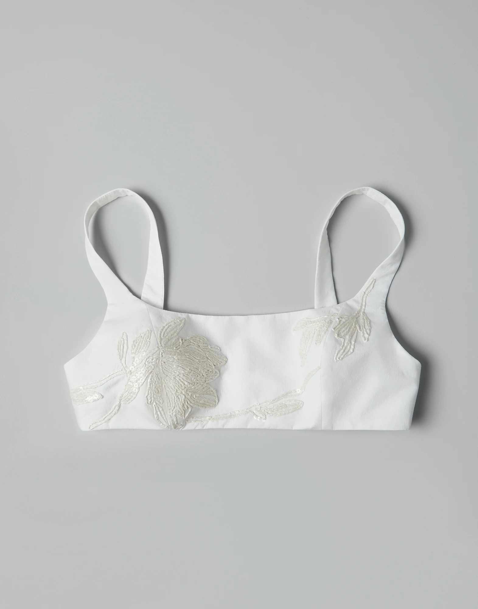Lightweight wrinkled cotton poplin crop top with dazzling magnolia embroidery
