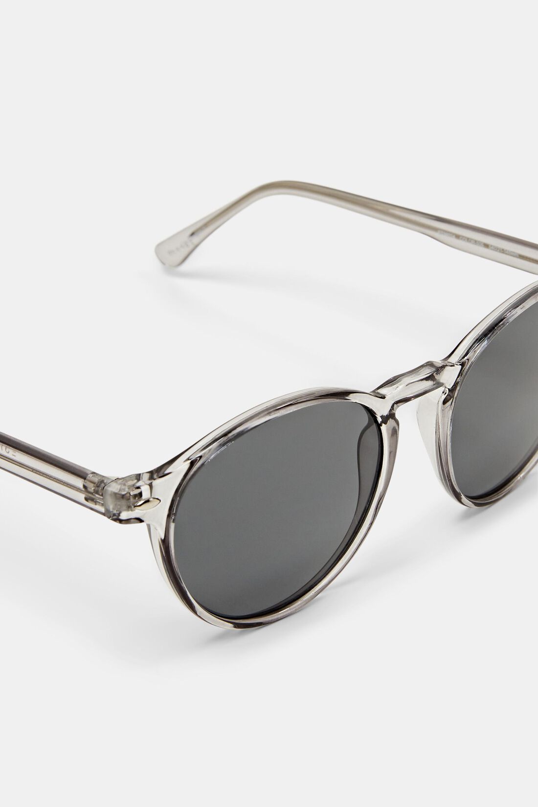 Sonnenbrille mit transparenter runder Fassung