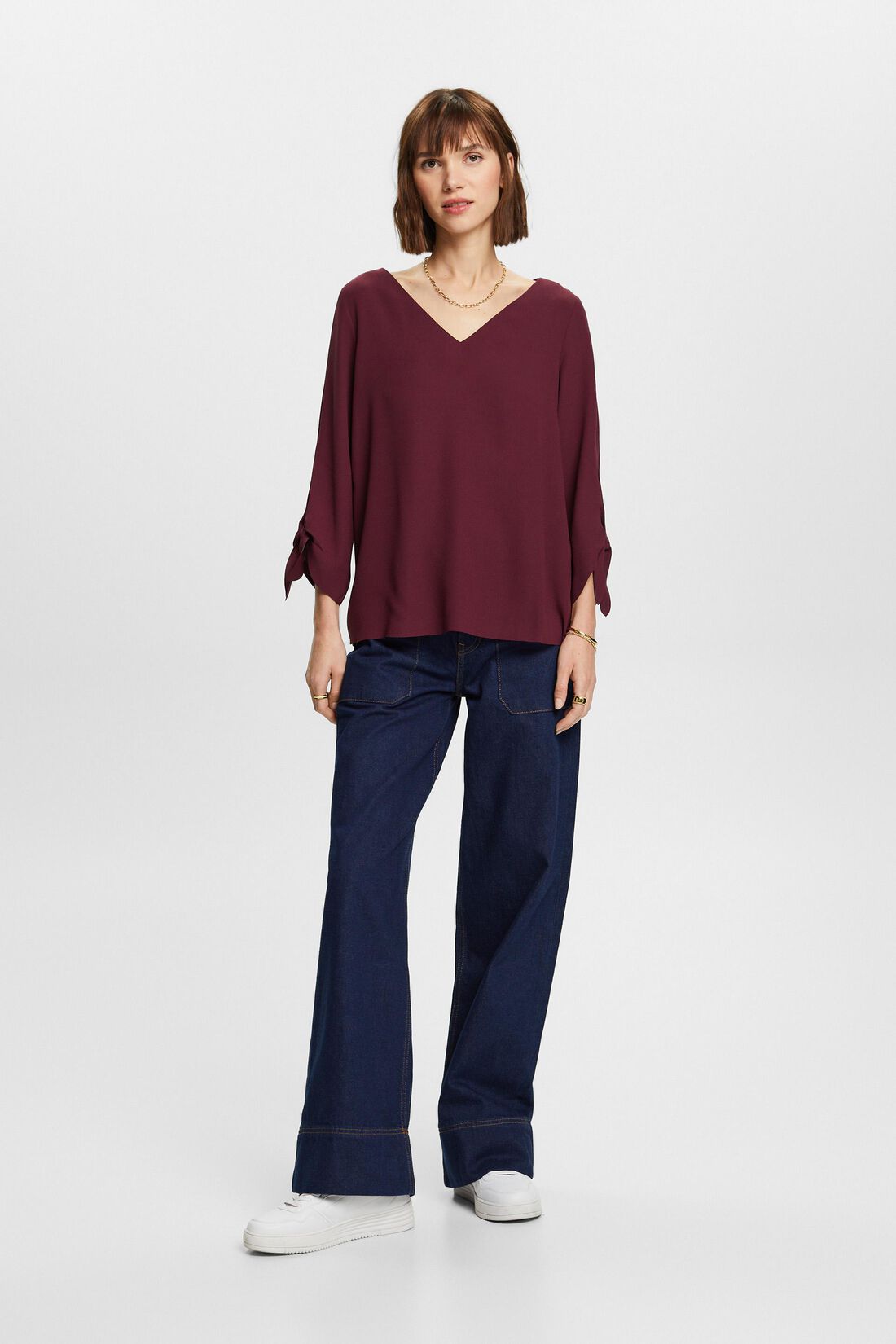 Stretch-Bluse mit offenen Kanten