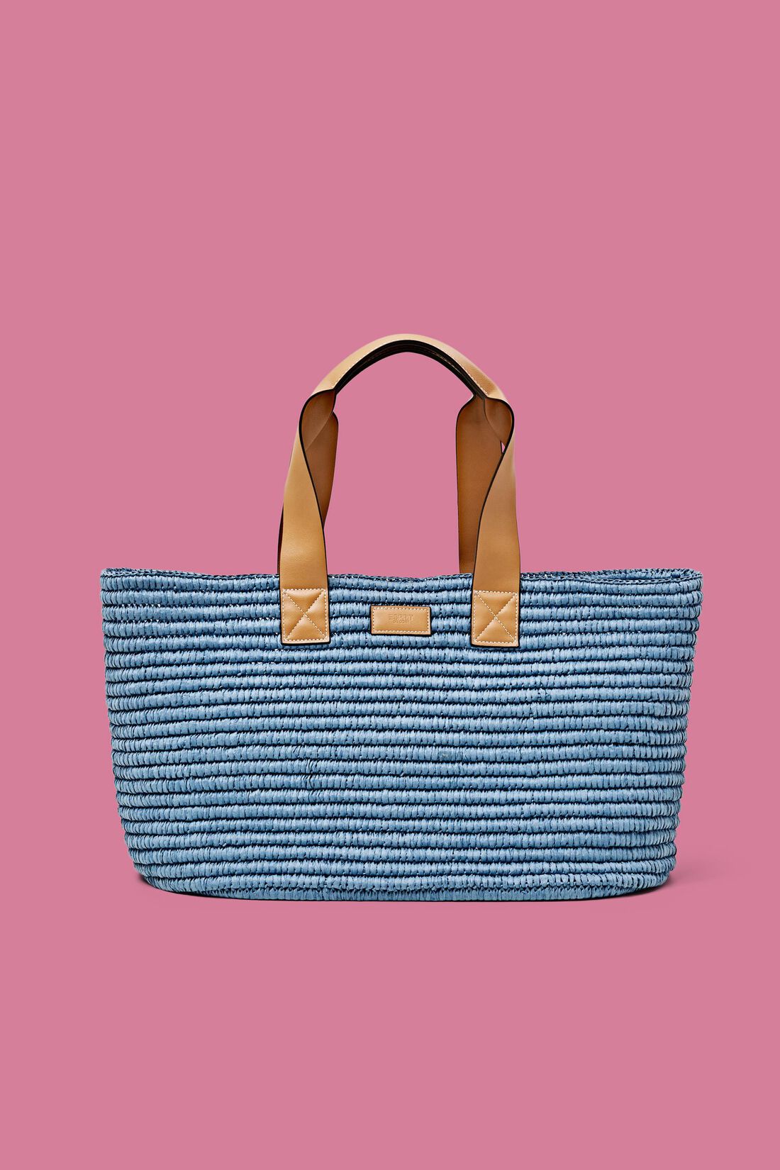 Basttasche mit Details in Lederoptik