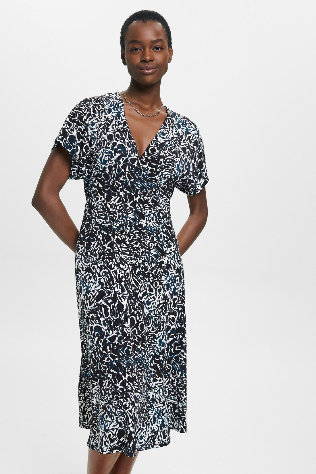 Jerseykleid mit V-Ausschnitt und Allover-Print