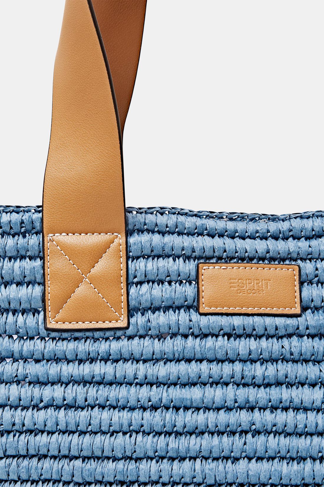Basttasche mit Details in Lederoptik