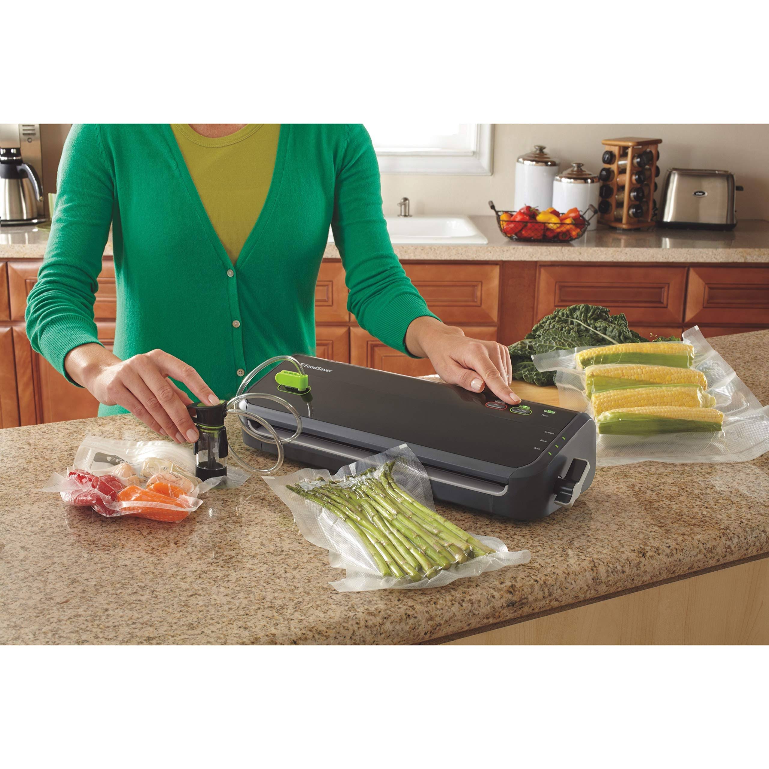 Foodsaver FM2000 Vacuum Sealer System with Starter Bags u0026 Rolls, Black