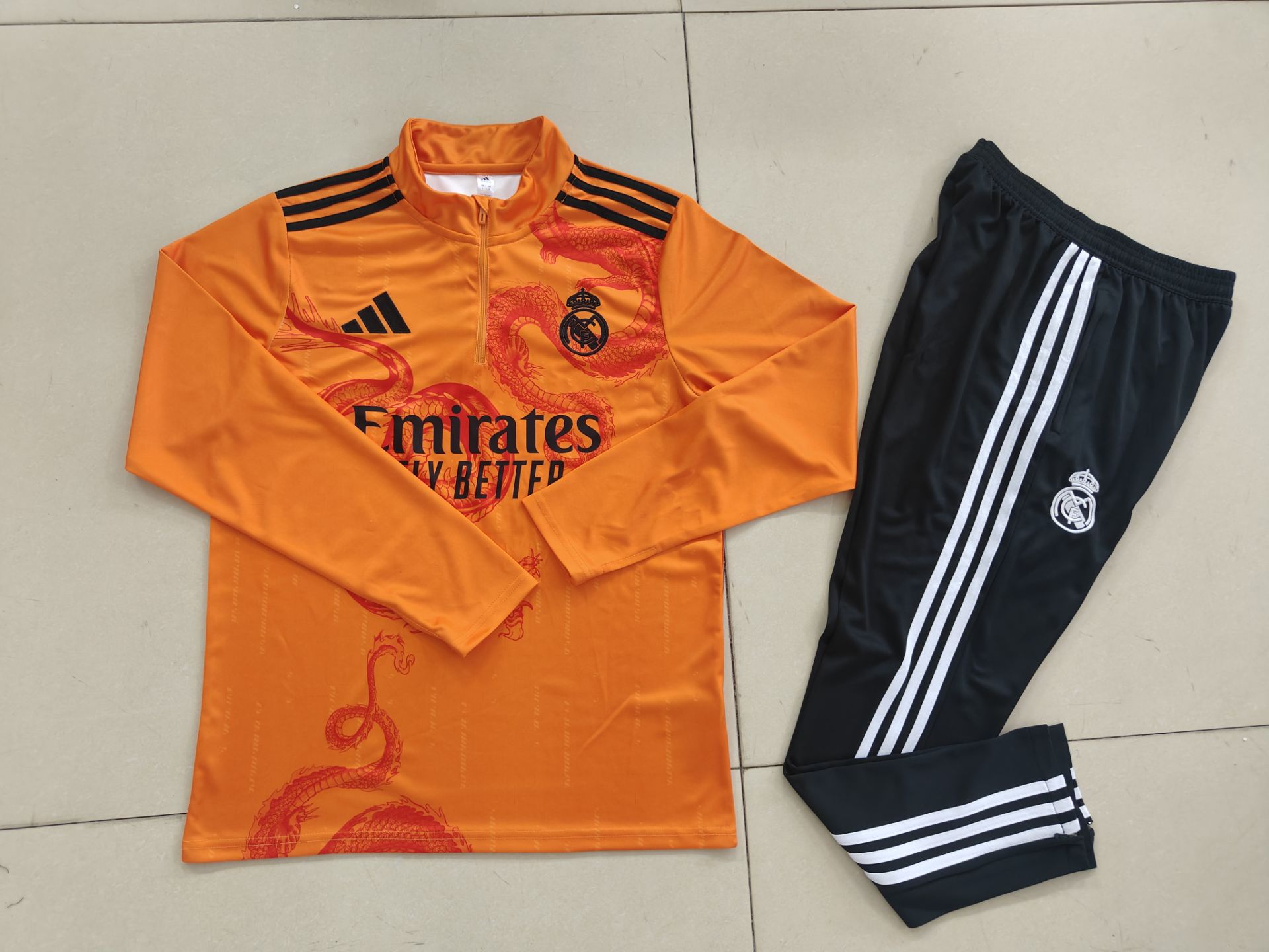 24/25 Real Madrid orange special edition half-pull training suit 1:1 Thai quality