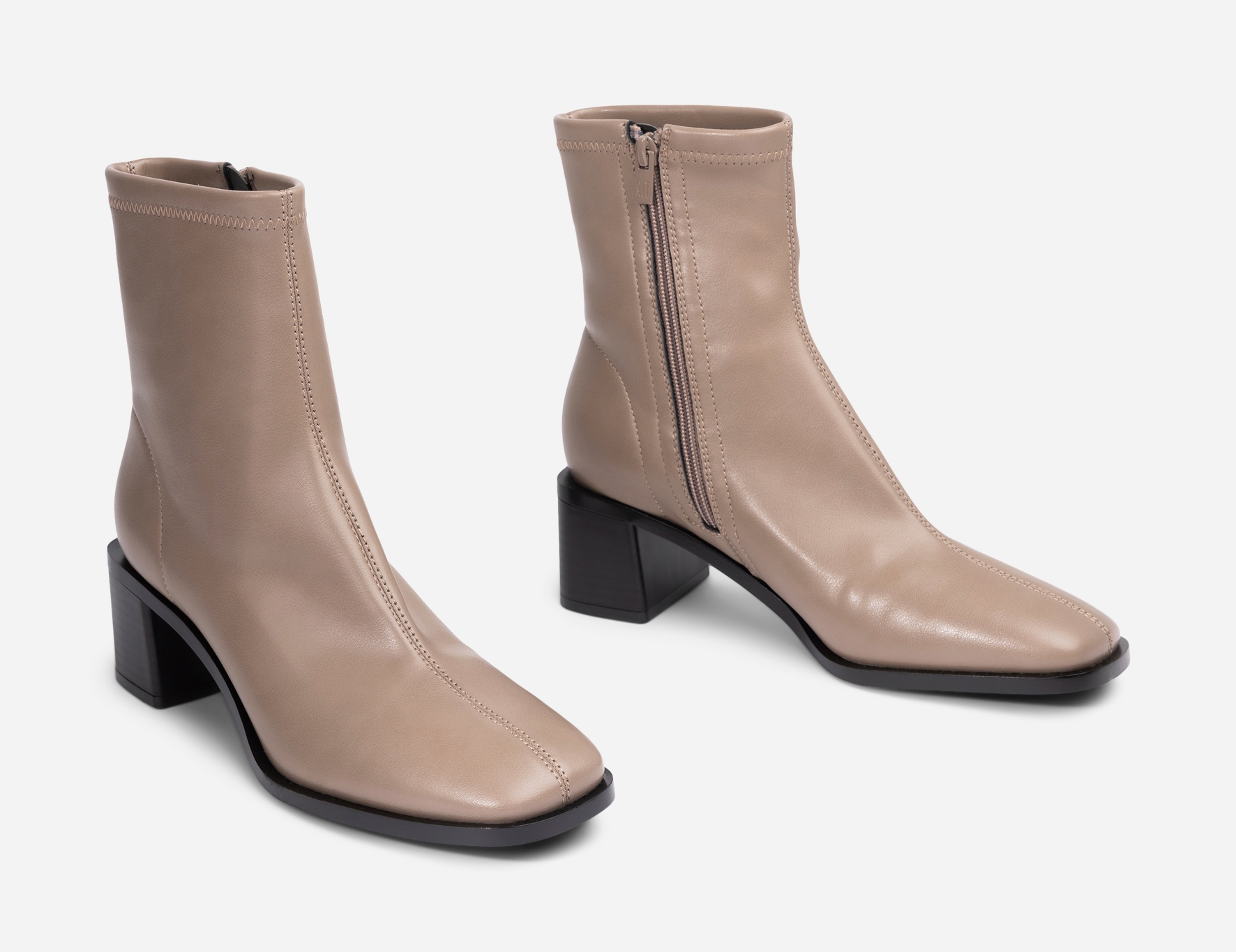 XIT, Boots med dragkedja