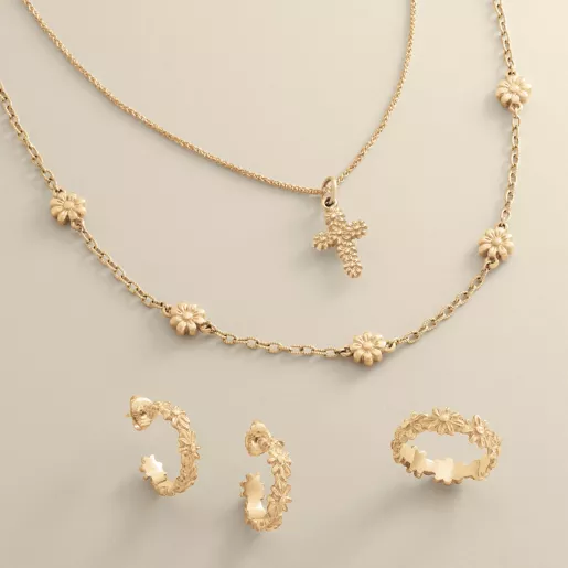 Layered Rings Featuring Flowers and Gemstones