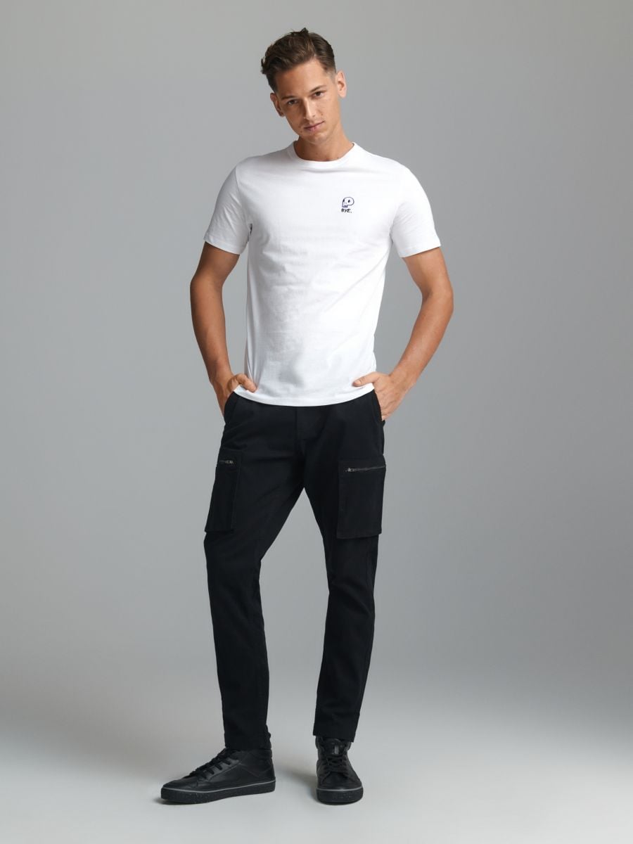 Spodnie slim Kolor czarny  9357C-99X