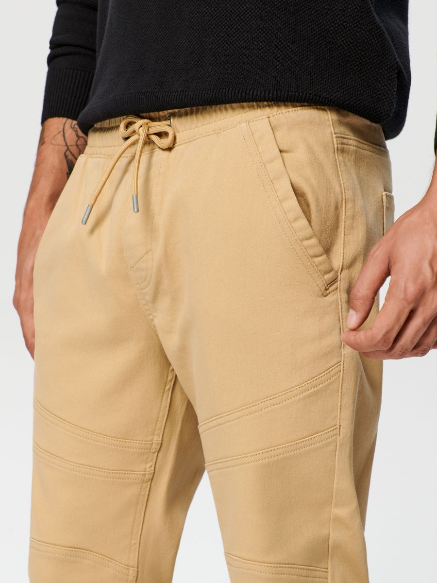 Jeansy slim jogger Kolor beżowy  5327F-08X