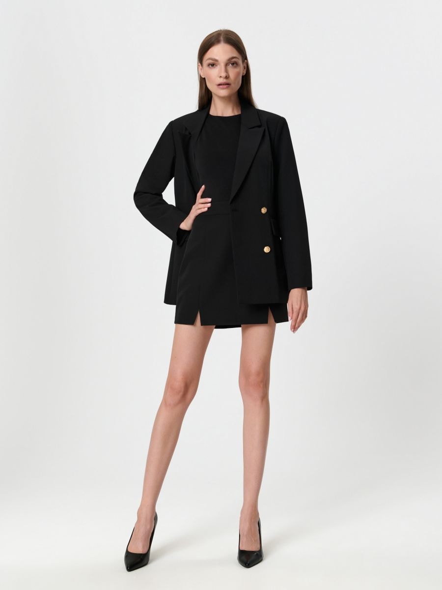 Spódnica mini z rozcięciem Kolor czarny  7124J-99X