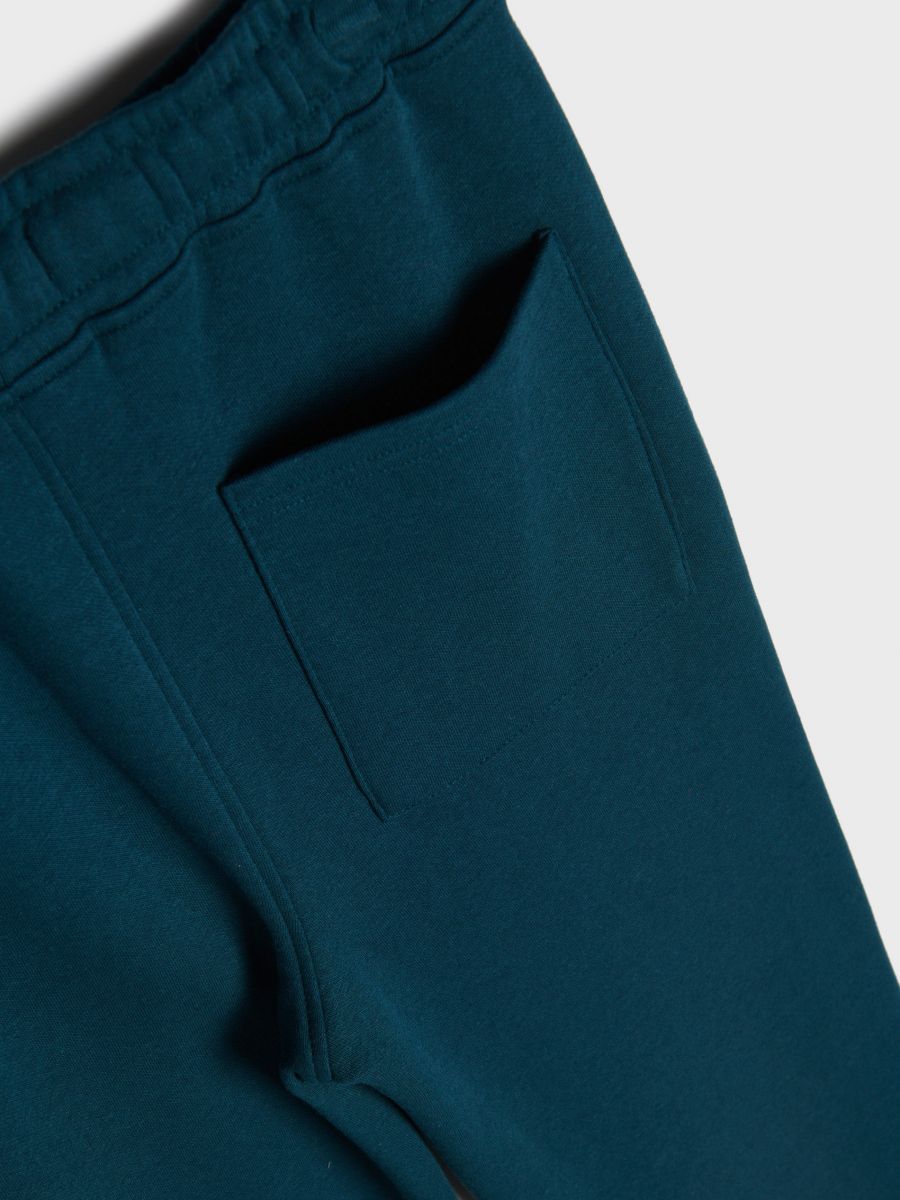 Spodnie dresowe jogger Kolor niebieski  7304Y-95X