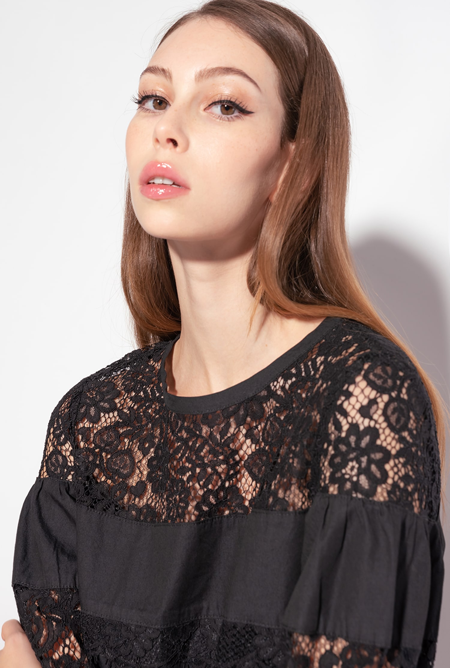 Black denim and lace blouse