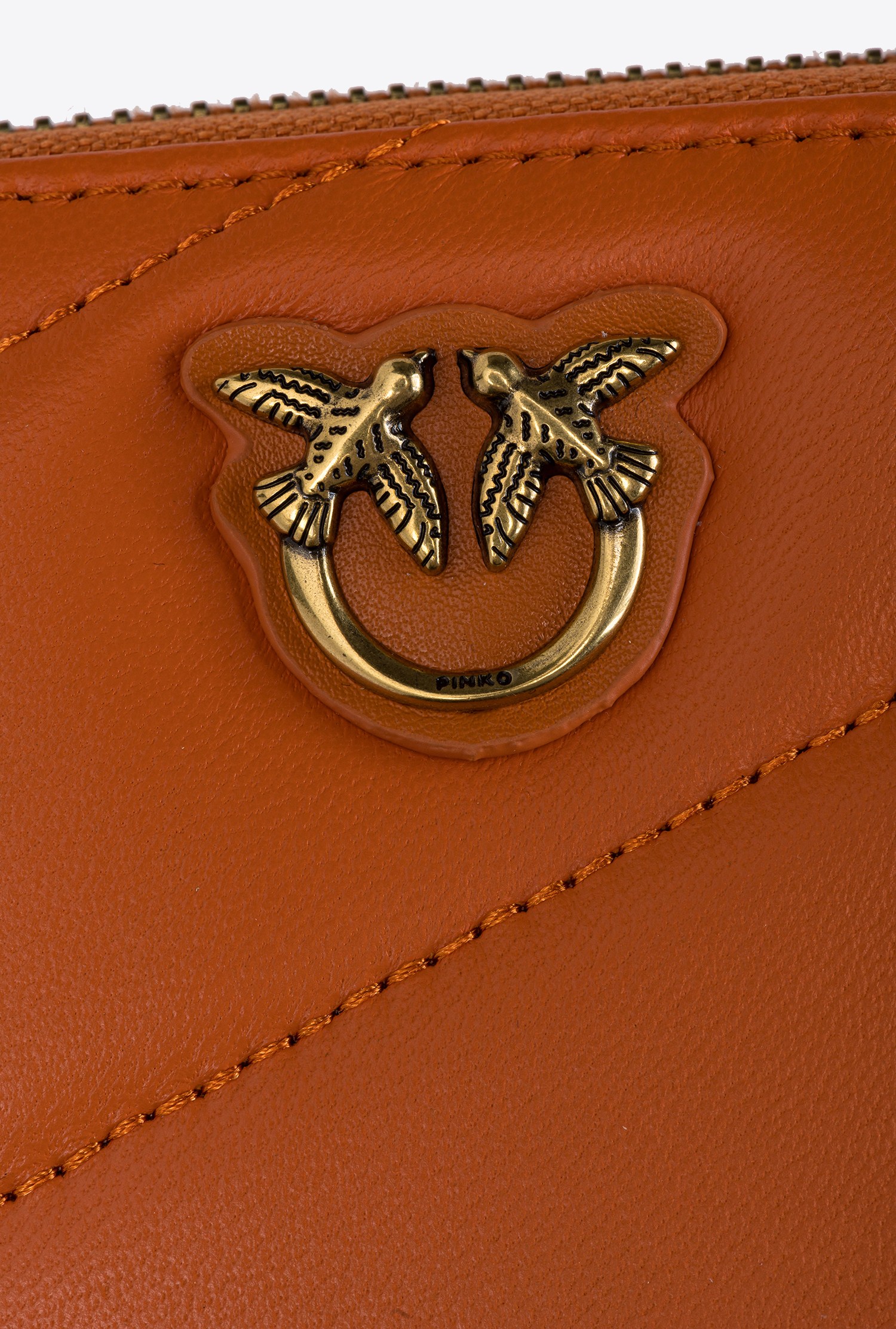 Zip-around quilted wallet