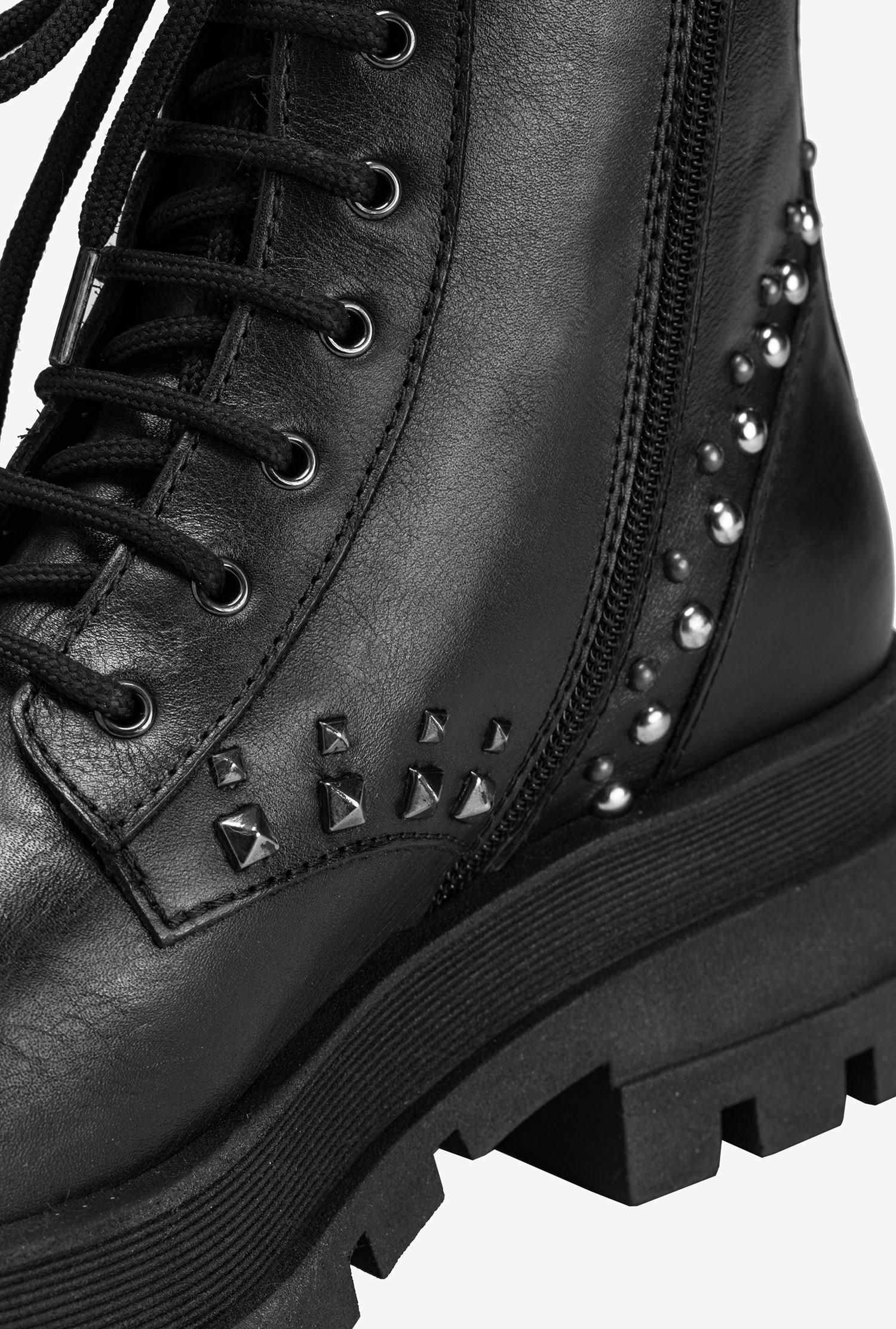 Leather combat boots with strap and studs
