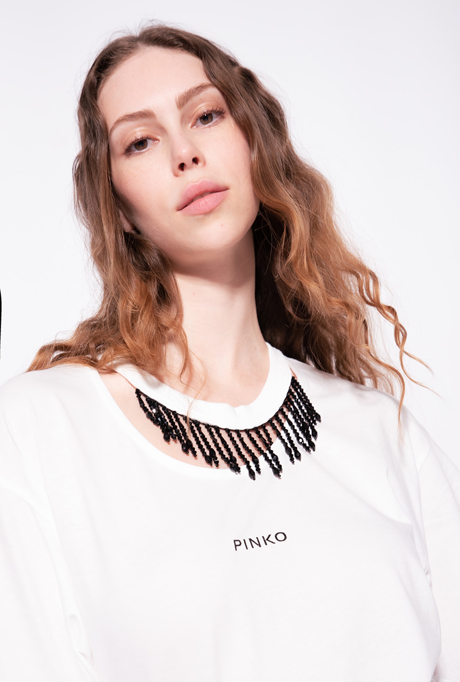 T-shirt with beads on the neck