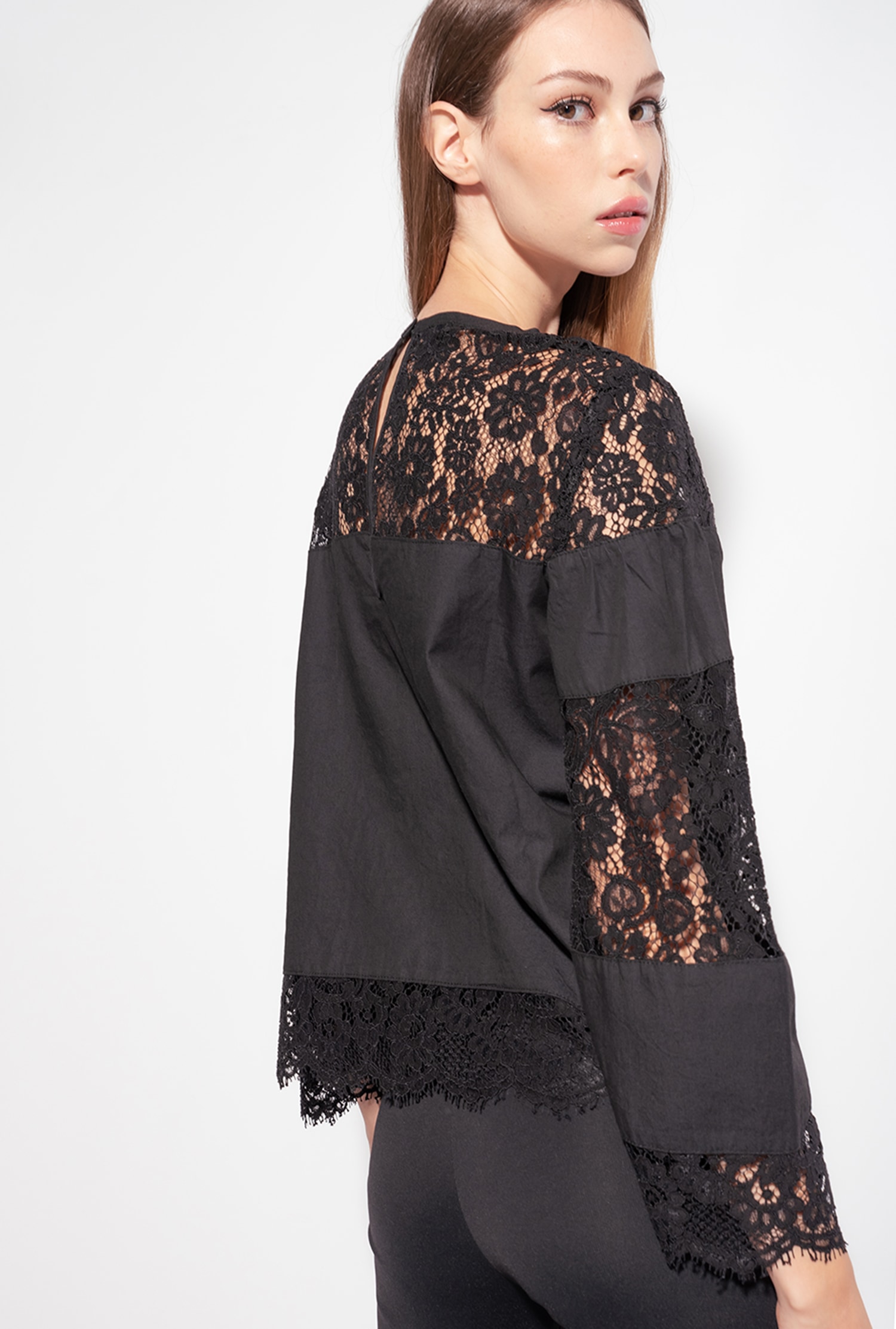 Black denim and lace blouse