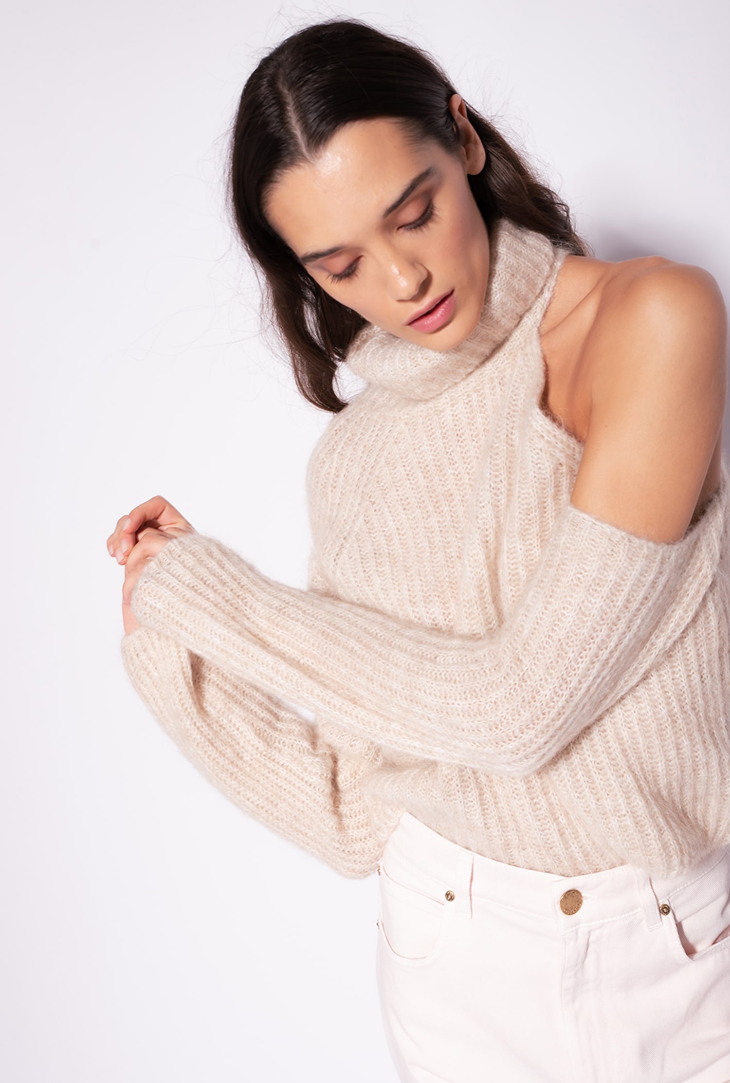 Turtleneck sweater with open shoulder