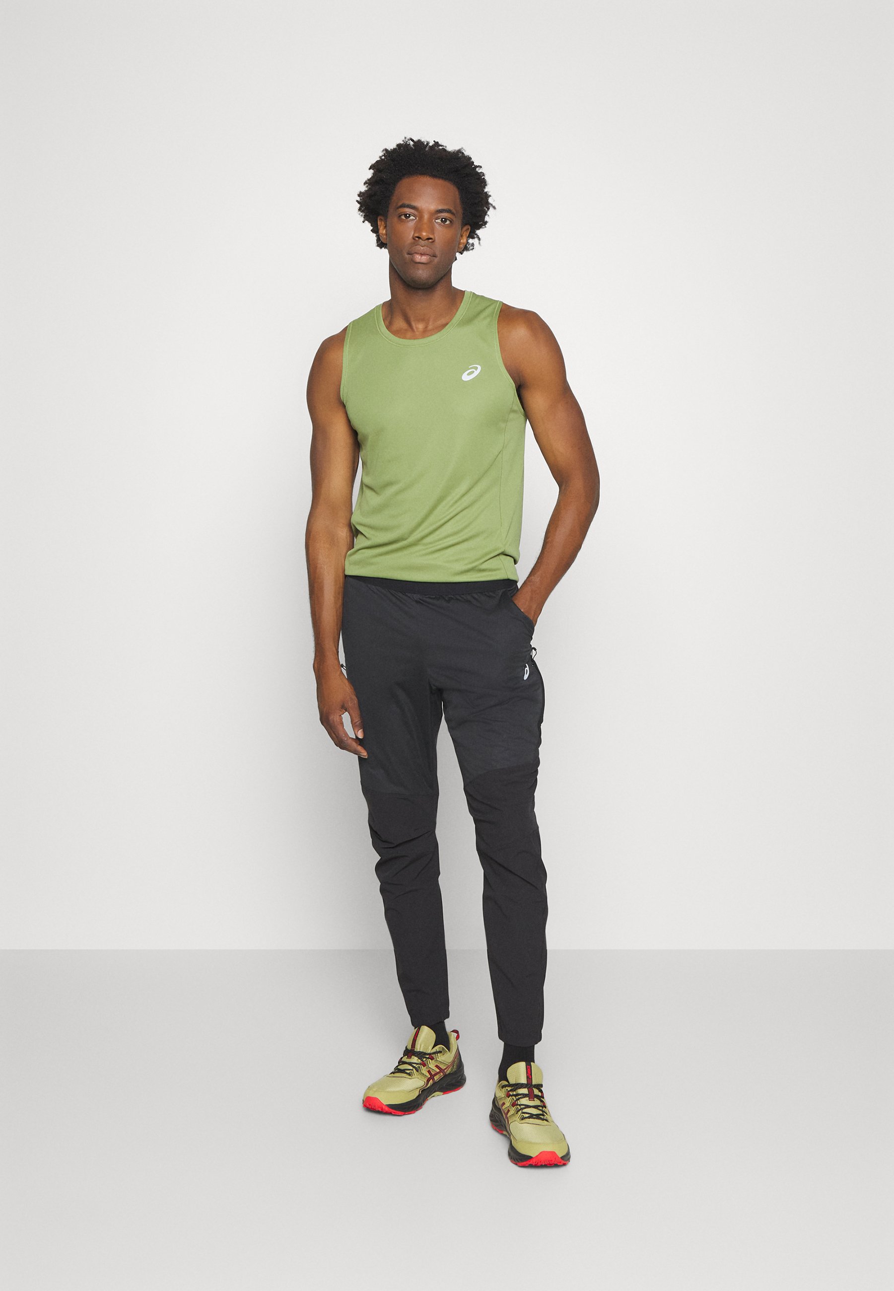 ASICS WINTER RUN PANT - Tracksuit bottoms - performance black/black