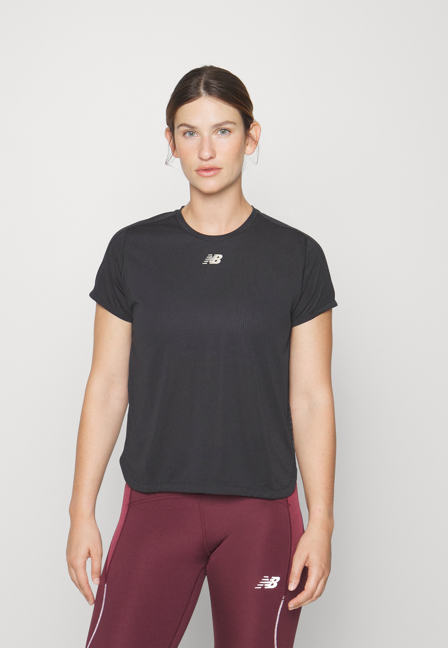 NB IMPACT RUN LUMINOUS SHORT SLEEVE - Sports T-shirt - black heather/black
