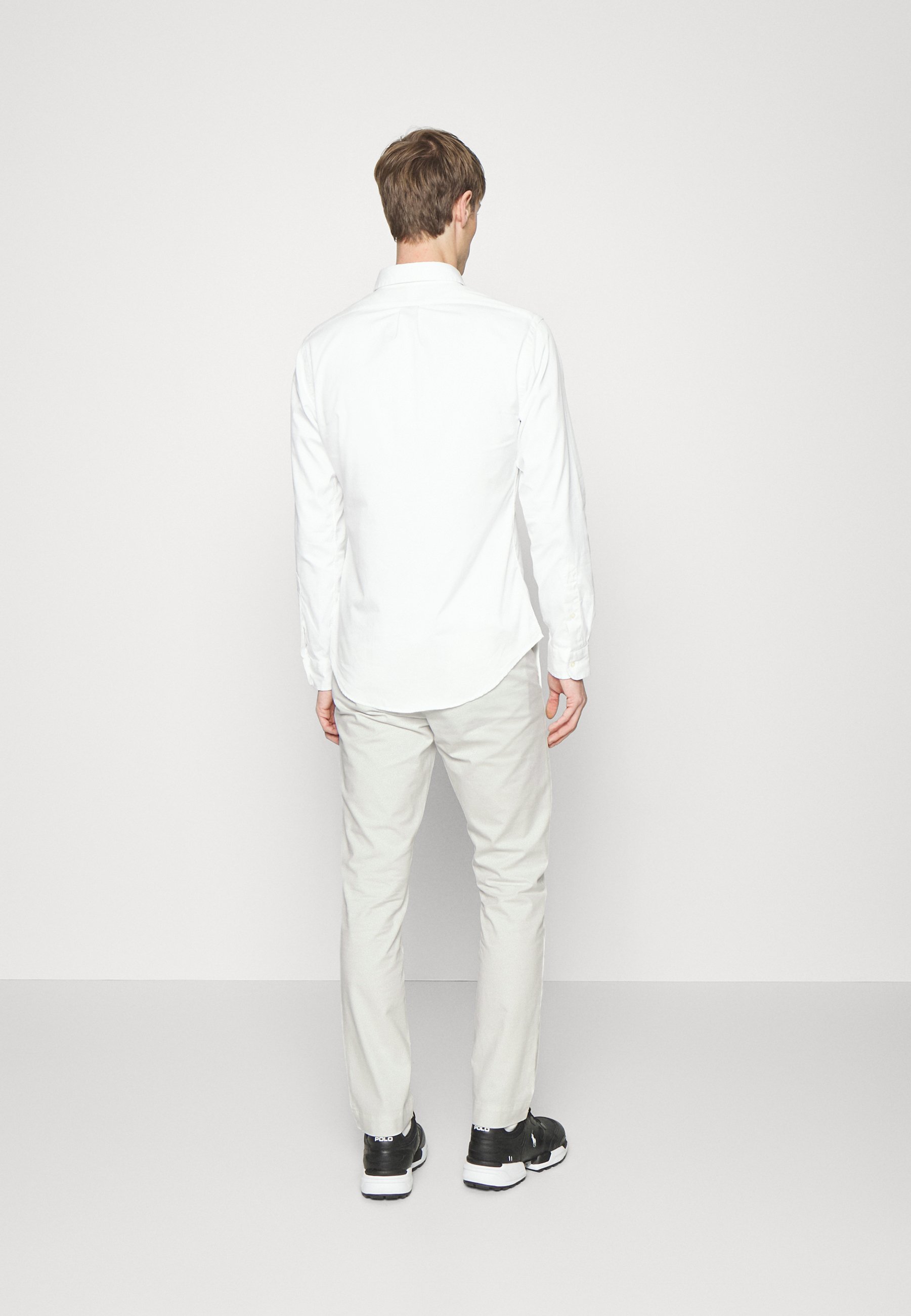 Polo Ralph Lauren STRETCH SLIM FIT TWILL PANT - Chinos - deckwash white/white